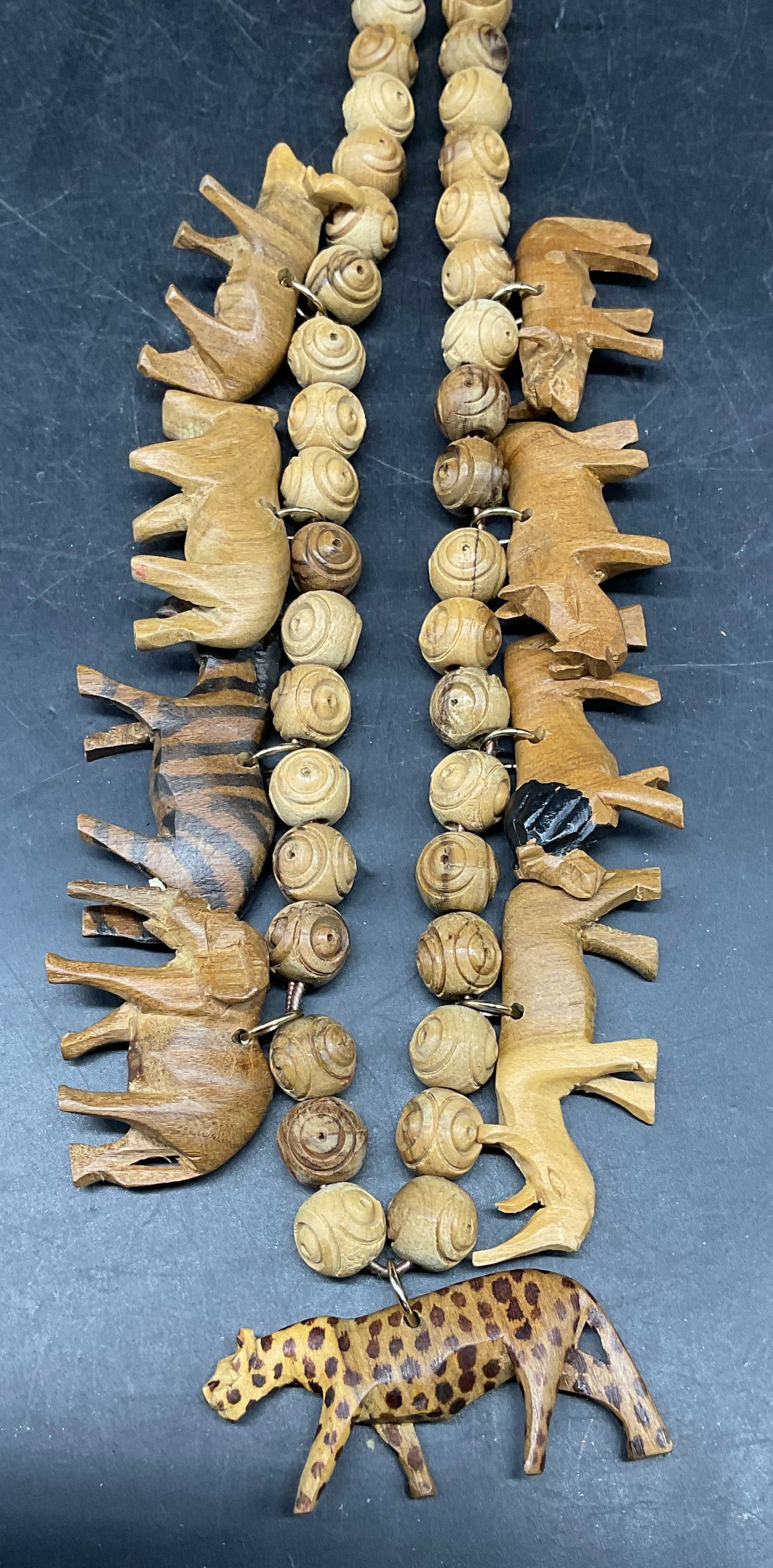 Vintage Carved Wood Animal Beaded Necklace: Vintage necklace with carved wood animal motif beads. Drop length 27 inches. Some scratching. Jewelry, estate jewelry, costume jewelry, cocktail jewelry, fashion jewelry, accessories, fashion accessor