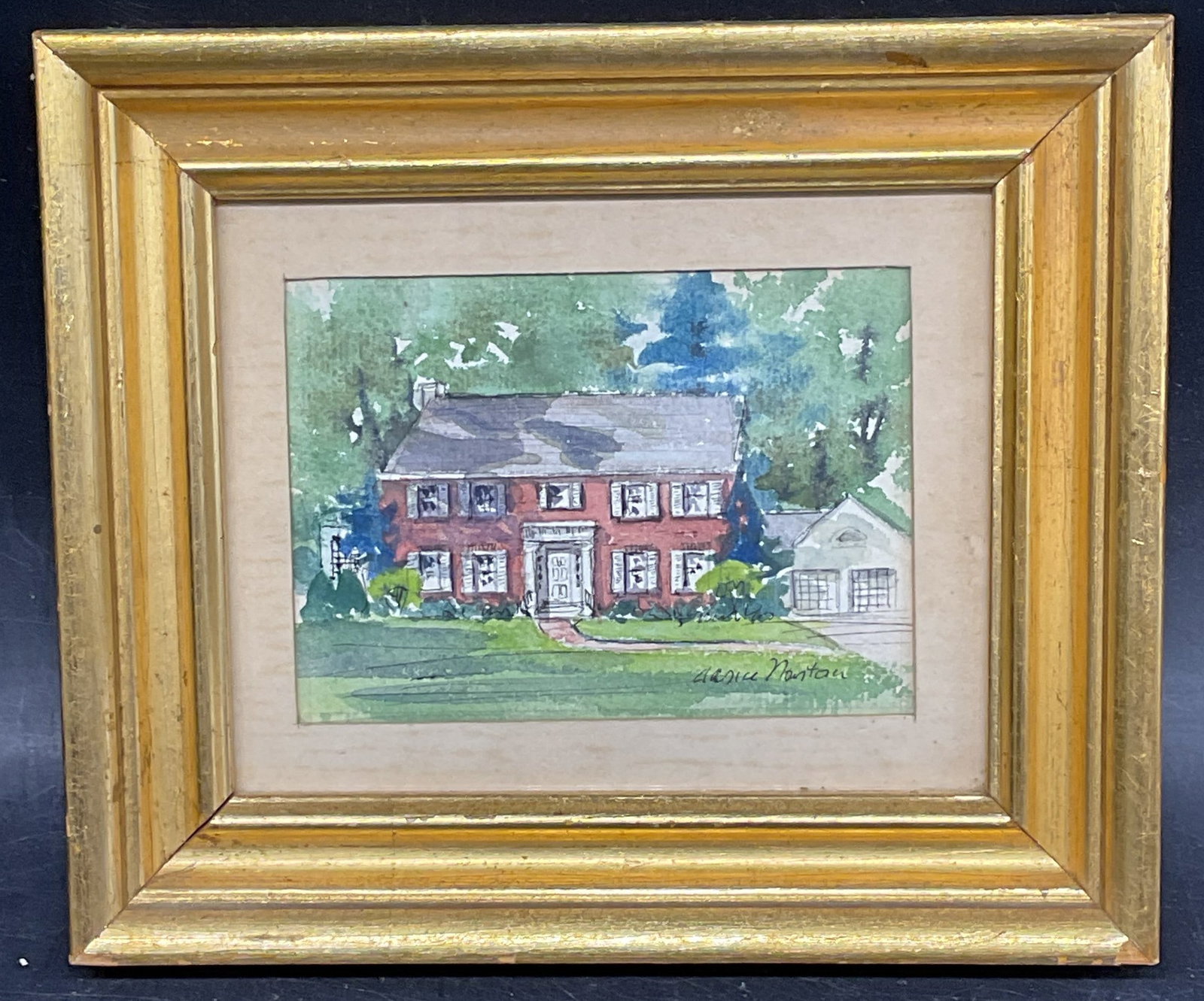 Signed Clarice Norton House Watercolor Painting: Framed and matted watercolor painting. Signed lower right, Clarice Norton (American, 20th century). Artist stamp on verso, dated 1967. View of house exterior. Gilt wood frame. Frame measures approx. 6