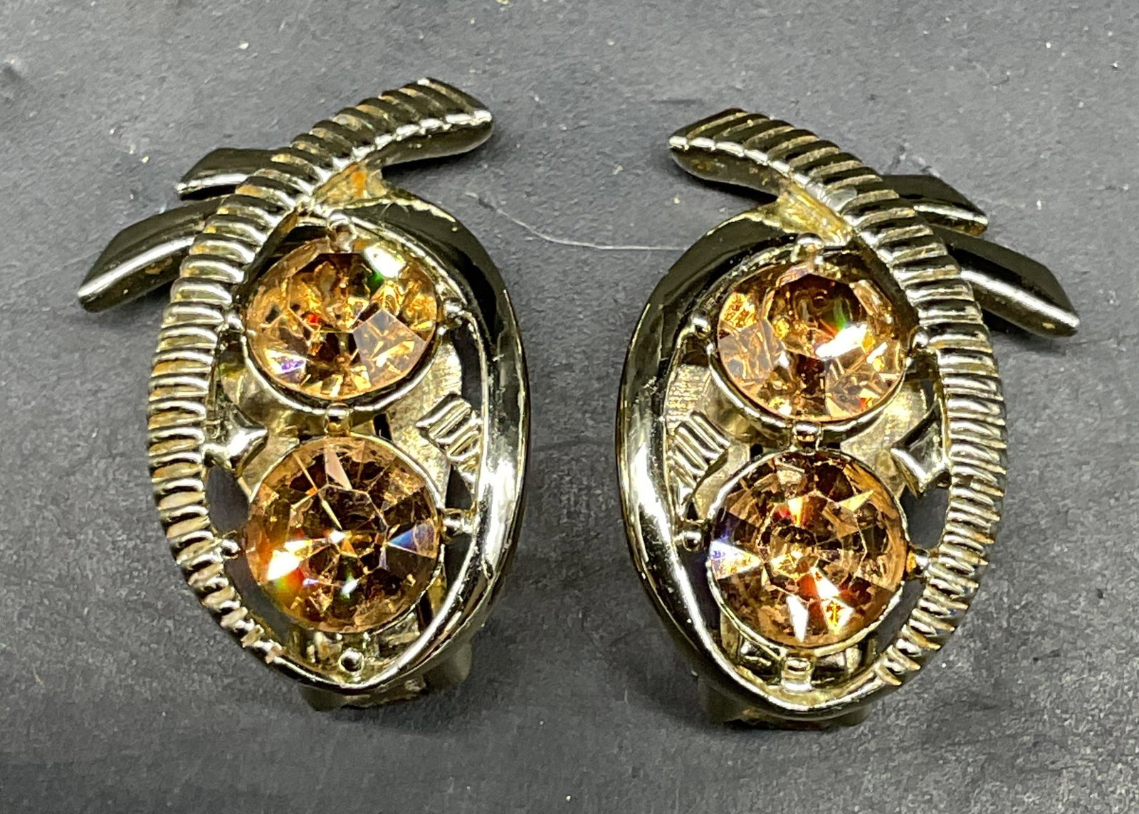 Vintage Kramer Gold Tone Rhinestone Earrings: Vintage Kramer gold tone and rhinestone earrings. Measures approx. 1.25 inches long. Some scratching. Jewelry, estate jewelry, costume jewelry, cocktail jewelry, fashion jewelry, accessories, fashion 
