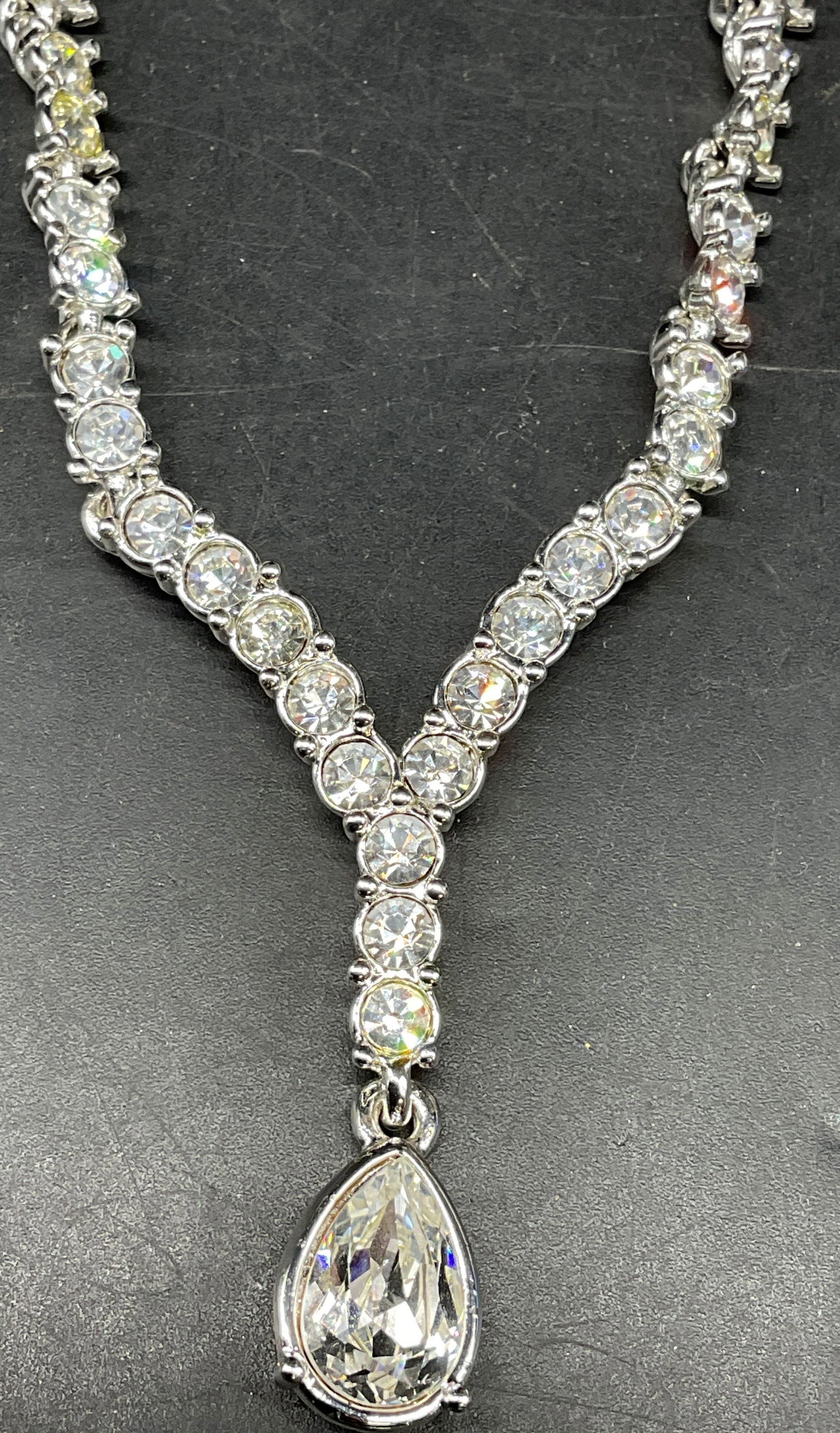 Napier Silver Tn Rhinestone Drop Necklace NWT: Vintage Napier silver tone rhinestone drop necklace. New with tag. Drop length 8 inches. Some scratching. Jewelry, estate jewelry, costume jewelry, cocktail jewelry, fashion jewelry, accessories, fash