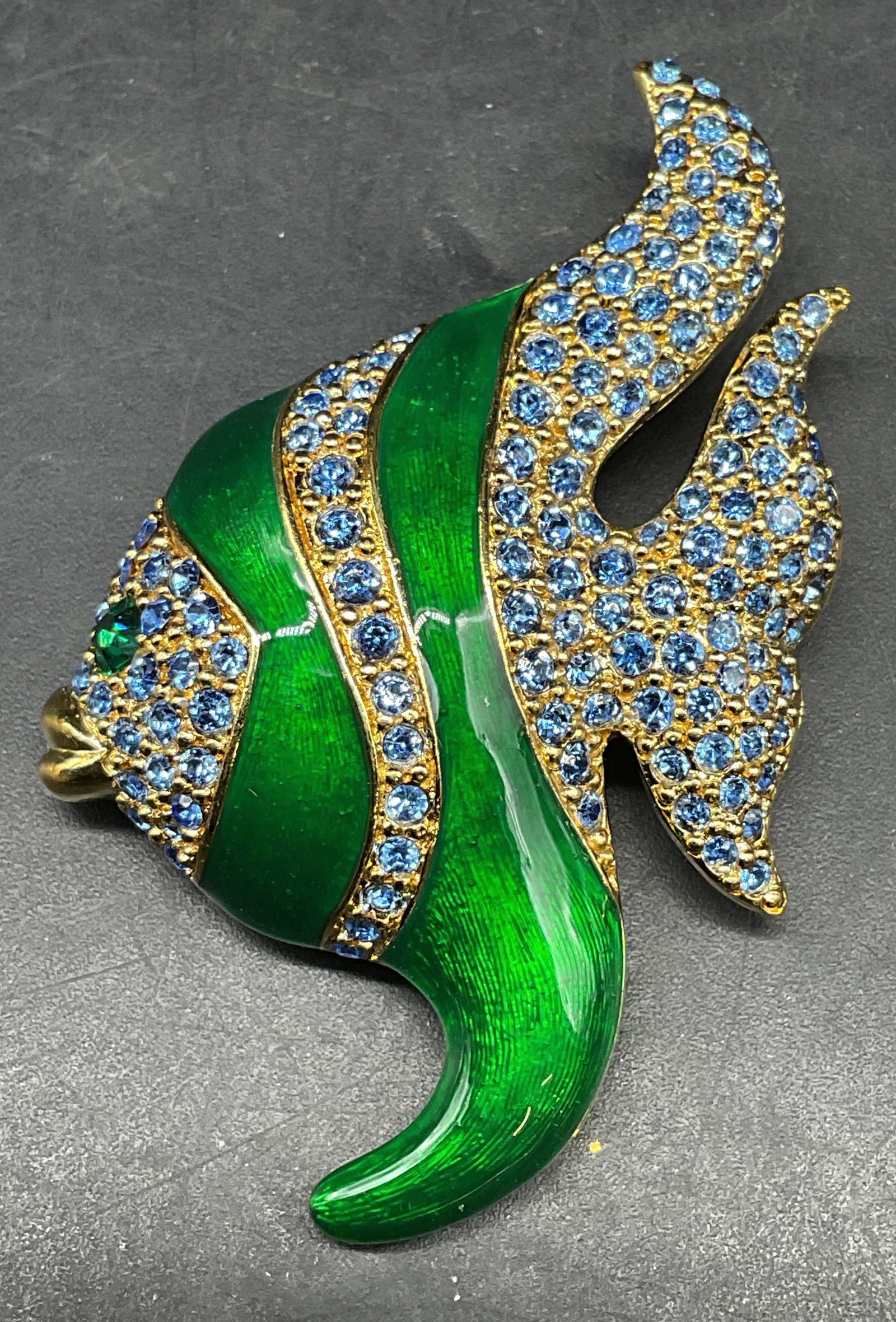 Napier Enamel Rhinestone Angelfish Brooch: Vintage Napier gold tone green enamel and blue rhinestone angelfish brooch. Measures approx. 2.25 x 1.5 inches. Some scratching. Jewelry, estate jewelry, costume jewelry, cocktail jewelry, fashion jew