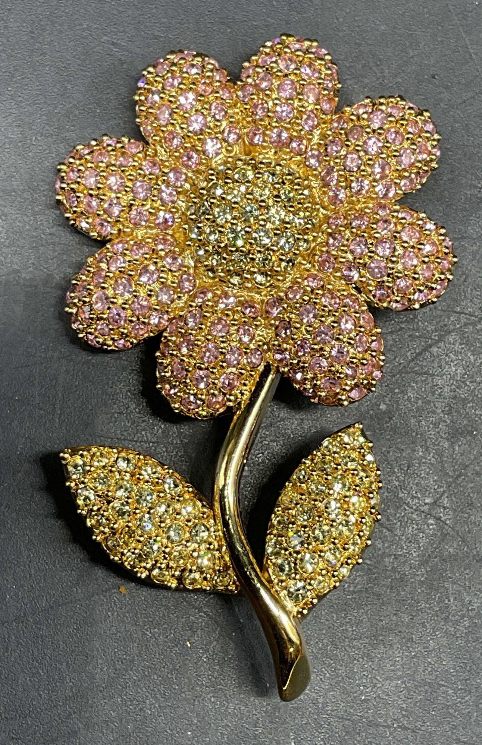 Napier Gold Tone Pink Rhinestone Flower Brooch: Vintage Napier gold tone pink and colorless rhinestone flower brooch. Measures approx. 2.25 x 1.25 inches. Some scratching. Jewelry, estate jewelry, costume jewelry, cocktail jewelry, fashion jewelry,
