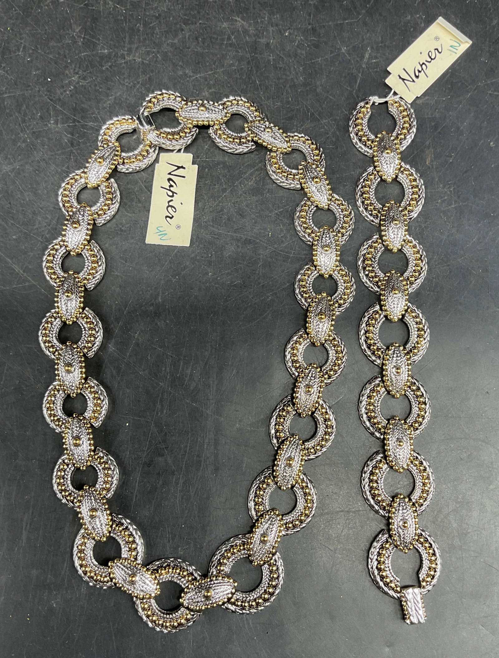 2 Napier Silver Tone Chain Necklace & Bracelet: Lot of 2 vintage matching Napier jewelry pieces. New with tags. Silver and gold tone chain link bead detail necklace and bracelet. Necklace drop length 6 inches. Bracelet measures approx. 7 inches lon