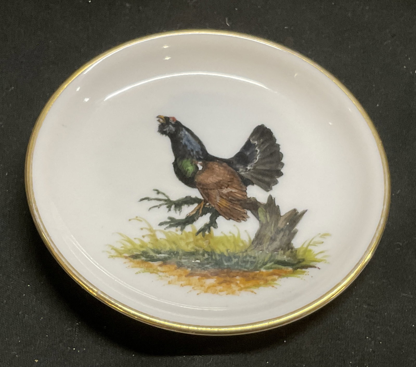 VTG PMM SGND Koniger Grouse Porc Dish GERMANY: Vintage Circa 1950s-1960s Signed PMM Porcelain Dish. Hand-Painted Wood Grouse Design by Koniger in Munich, Germany. Mold No. 6790. Some Color Loss. Measures app 0.5in H x 3.5in Diam. Vintage, 1950s, 1