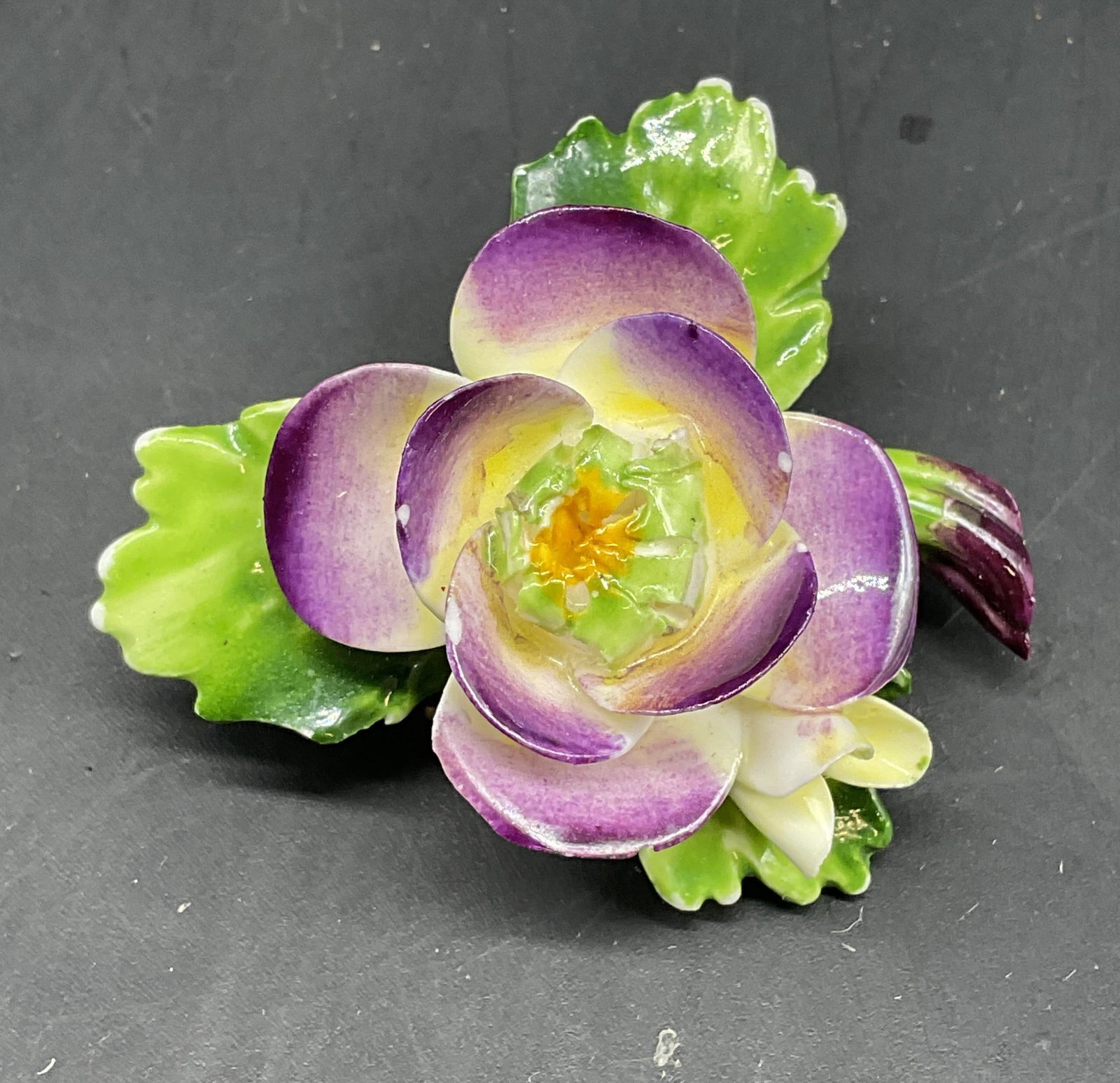 Vintage Cara China Flower Brooch England: Vintage Cara China Staffordshire flower brooch. Made in England. Measures approx. 2 inches wide. Some chips and scratching. Jewelry, costume jewelry, estate jewelry, cocktail jewelry, fashion jewelry,
