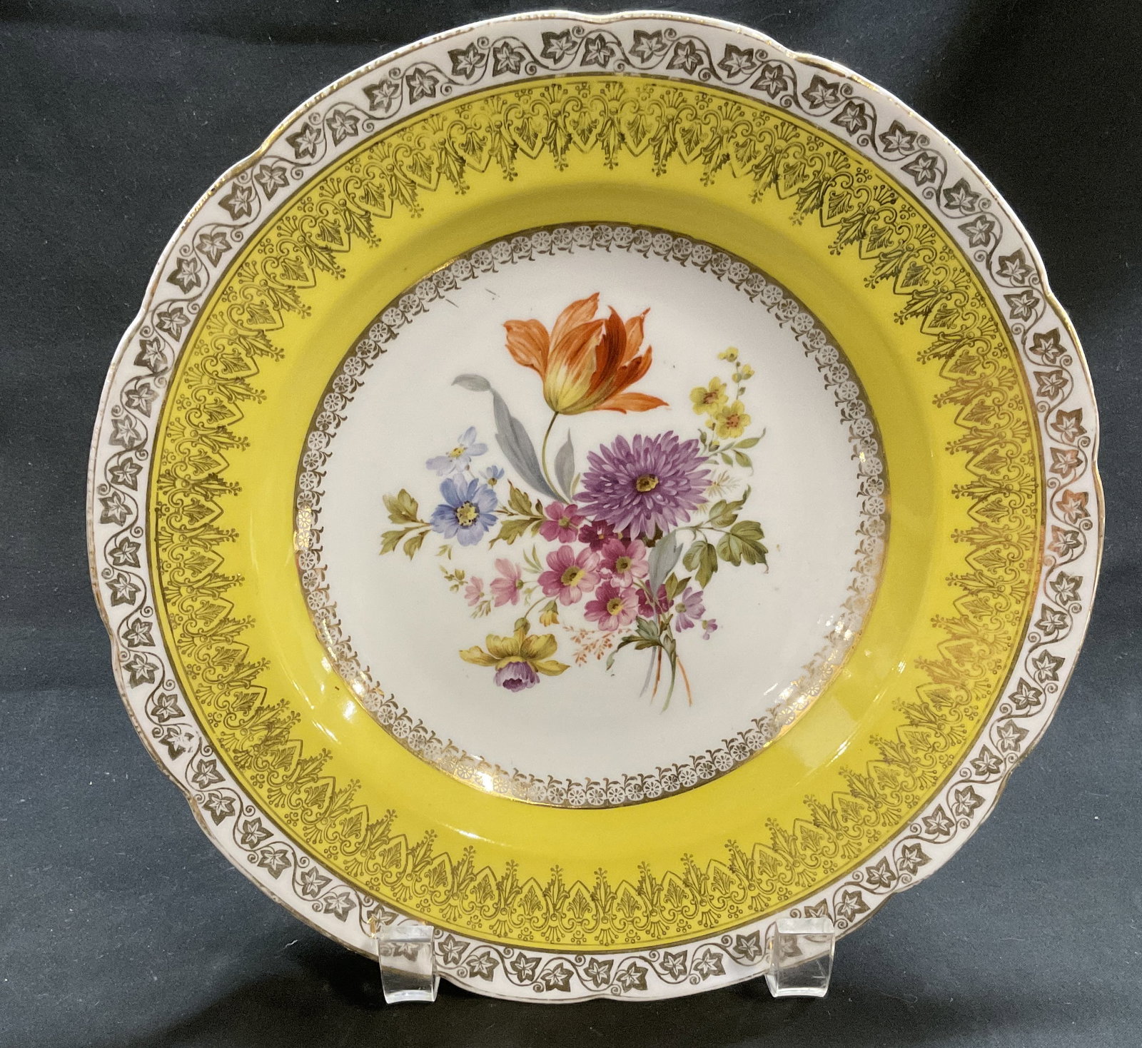 ANTQ Higgins & Seiter NY Floral Porc Bowl AUSTRIA: Antique Circa 1891-1915 Higgins & Seiter New York Porcelain Soup Bowl. Floral Design with Yellow Rim and Gilt Design Border. Made in Austria. Some Fading. Measures app 1.5in H x 9in Diam. Antique Plat