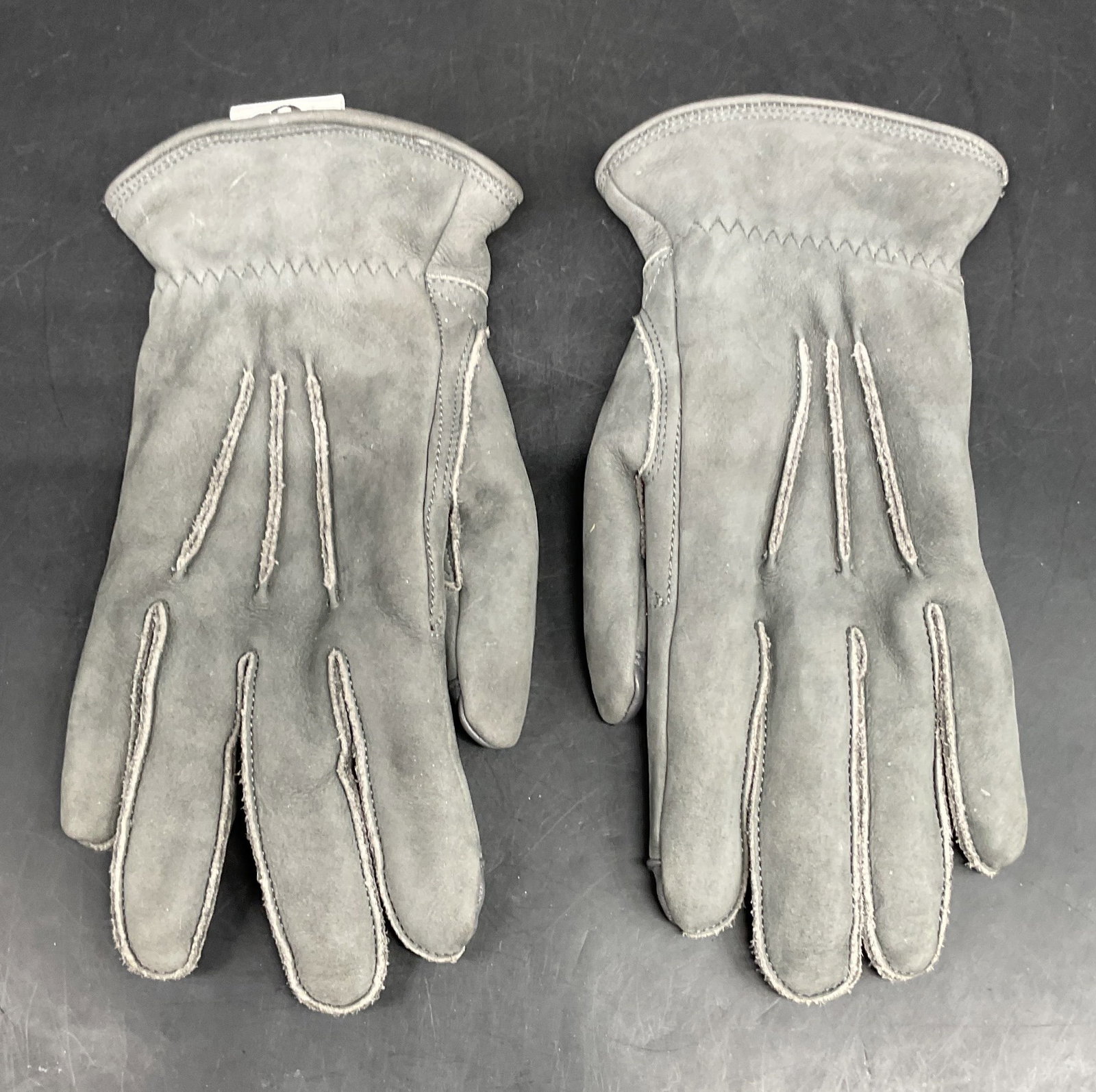 Ugg Grey Suede Faux Shearling Lined Gloves: Ugg grey suede gloves with faux shearling polyester lining. Size medium. Some blemishes and rubbing. Ugg gloves, designer gloves, suede gloves, leather gloves, grey gloves, accessories, fashion