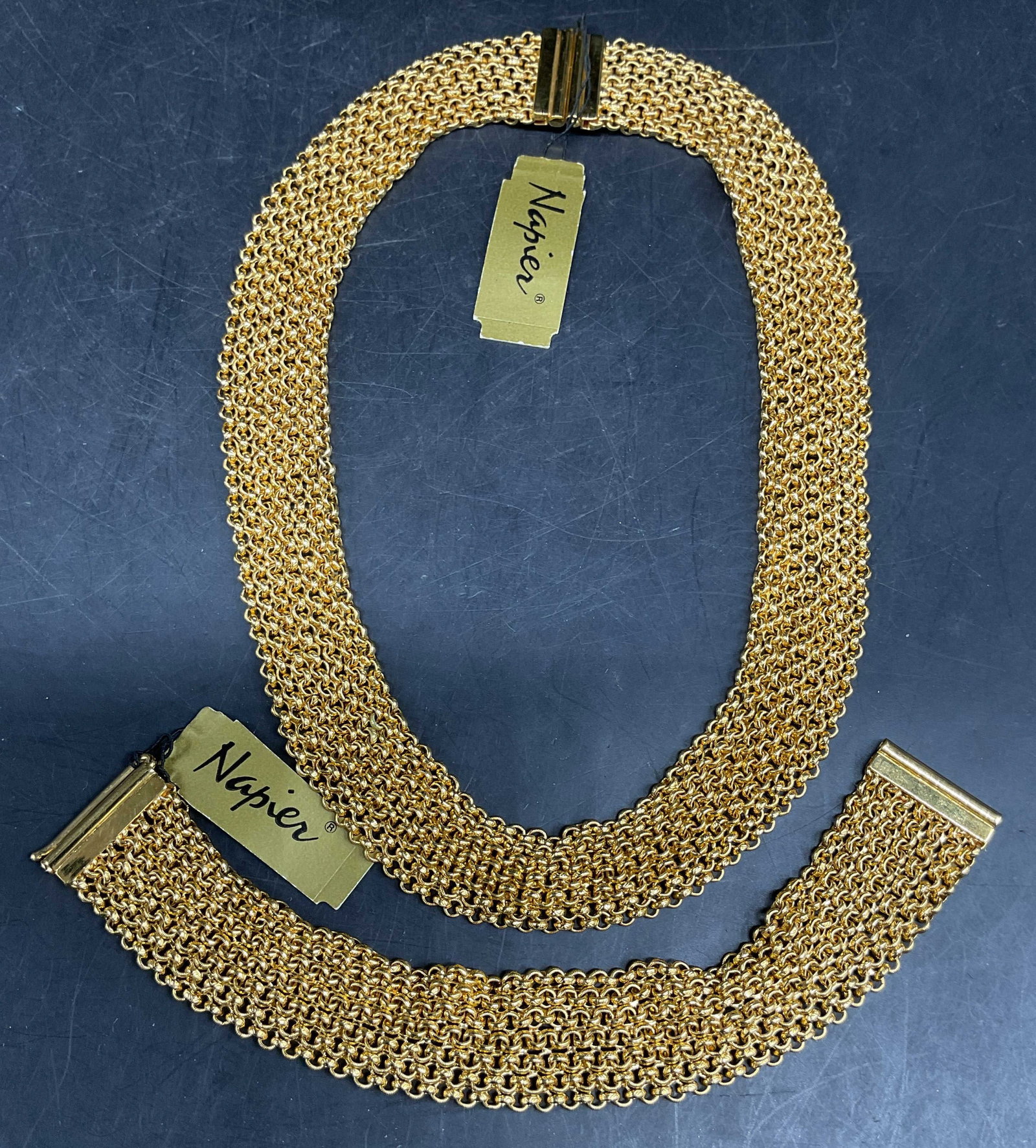 Lot 2 Napier Gold Tn Mesh Necklace & Bracelet: Lot of 2 vintage matching Napier gold tone mesh chain necklace and bracelet. Necklace drop length 5.75 inches. Bracelet measures approx. 7 inches long. Some scratching. Jewelry, estate jewelry, costum