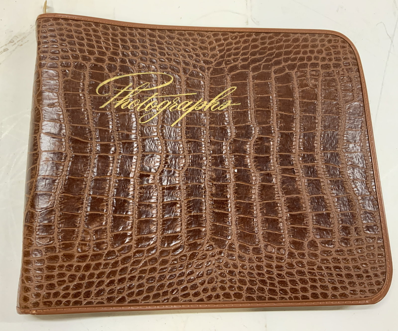 Antq Photo Album Scrapbook: Antique photo album scrapbook. Features a brown crocodile embossed leather, 3 metal interior rings with black card stock papers and an envelope to keep extra photos and supplies. And photos written in