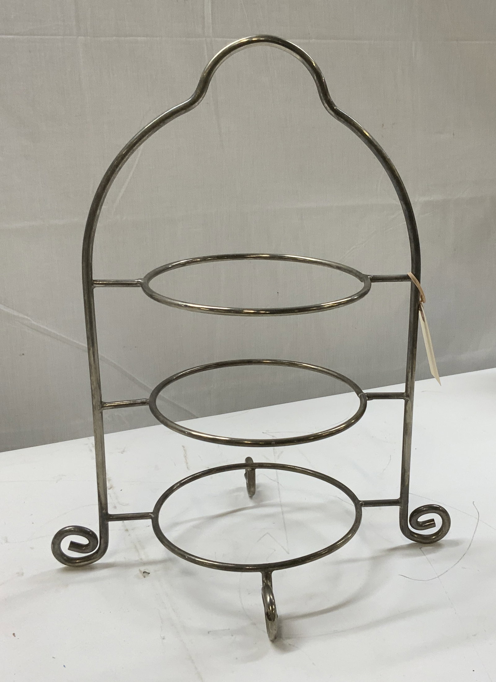 Three Tier Metal Cake Stand Frame: Three tier metal cake and pastry stand frame. Pastry stand, cake stand , dessert display wear from age and use App 17.5 in height app 10.5 in length each plate stand is 7 in diameter Cs 11