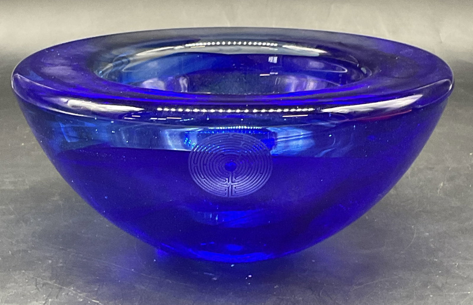 Cobalt Blue Etched Swirl Art Glass Bowl: Art glass bowl with etched swirl design and pattern in cobalt blue. Style of Kosta Boda, no visible signature or markings. Thick walled glass, piece has significant weight. Measures approx. 7 x 3 inch