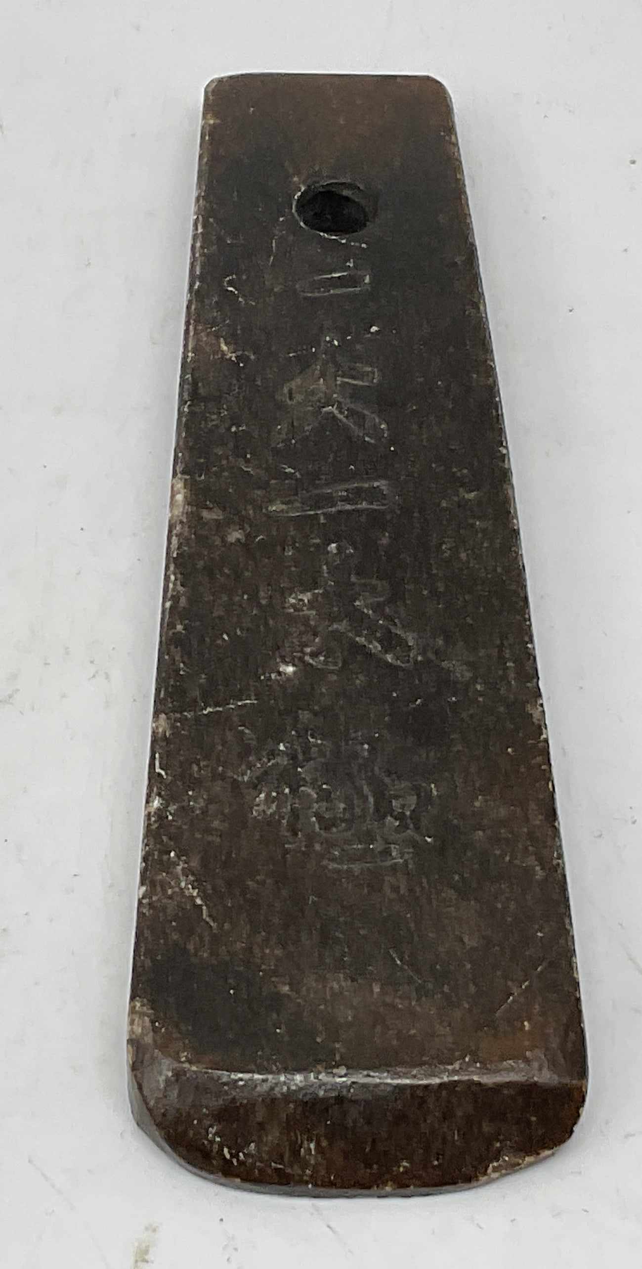 Chinese Textured Stone Tablet: Chinese Brown and Beige Textured Stone Tablet. Engraved Asian Characters. Hole at Top. Yin-Yang Circle on Back. Condition Consistent With Exposure. Measures app 6in H x 1.5in W. Chinese, Yin-Yang, Tai