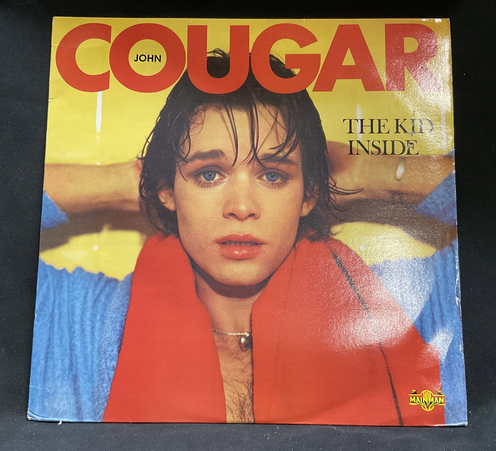 82 John Cougar Mellencamp The Kid Inside Vinyl LP: Vintage 1982 Mainman Records John Cougar Mellencamp The Kid Inside Vinyl LP. Tears on Cover and Seam Split. Not Tested. Measures app 12.5in H x 12.5in L. Vintage Records, 1980s, Mainman Records, John