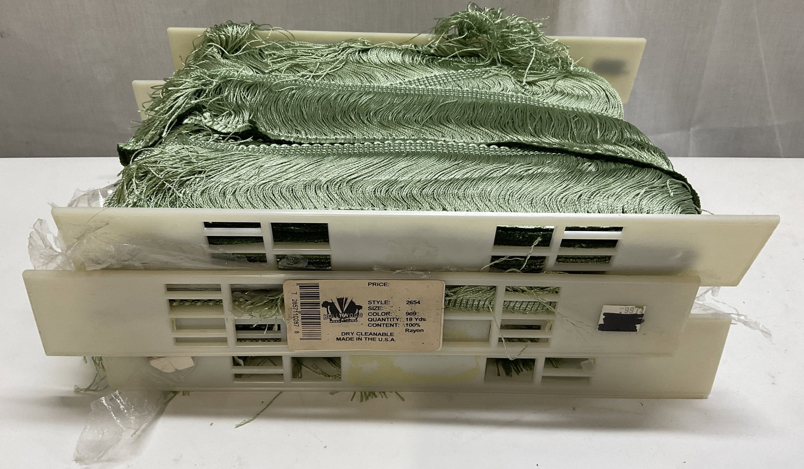 Lt3 Hollywood Trims Lime Green Rayon Fringe: Hollywood Trims Lime Green 100% Rayon Fringe Trim. Made in Los Angeles, California. Style 2654. Color 909. Originally 18 Yards Per Roll. Not Unrolled, Measured, or Inspected. Part of a NYC Interior