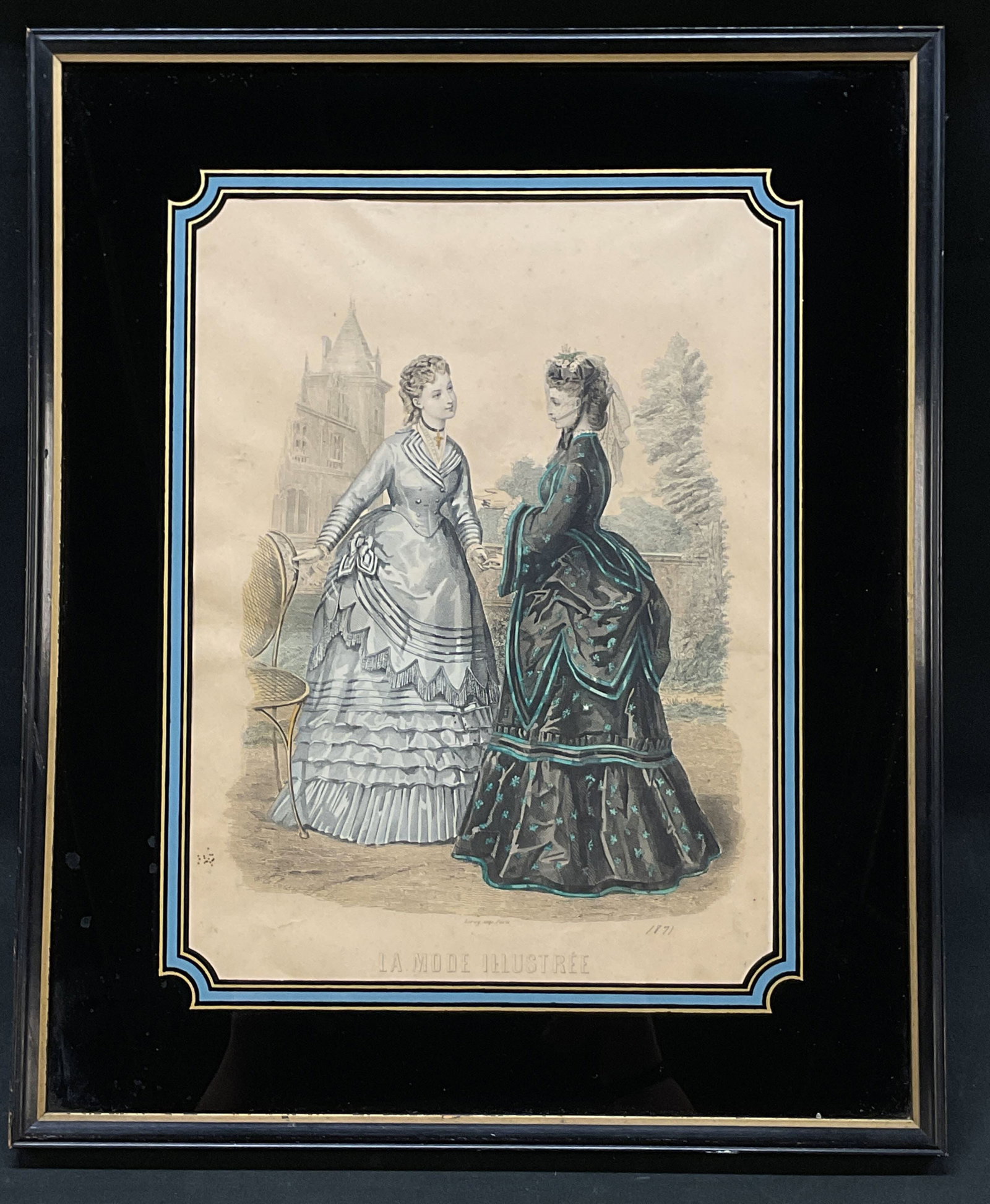 Atq. 1871 Framed Hand Colored Engraving, Paris: Antique from La Mode Illustree, French school, wooden frame with gold accent, framed Intaglio engraving on paper with black hand painted mat- gold and blue border design. With hanging wire. Two women 