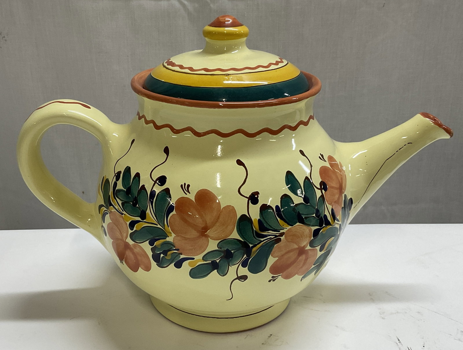 VTG SGND Kinga Szabo HUNGARIAN Folk Art Teapot: Vintage Circa 1980s-2000s Signed Kinga Szabo Hand-Painted Folk Art Earthenware Pottery Teapot. Made in Hungary. Yellow Glaze with Floral and Striped Designs. Chip on Spout. Measures app 8.25in H x 10.