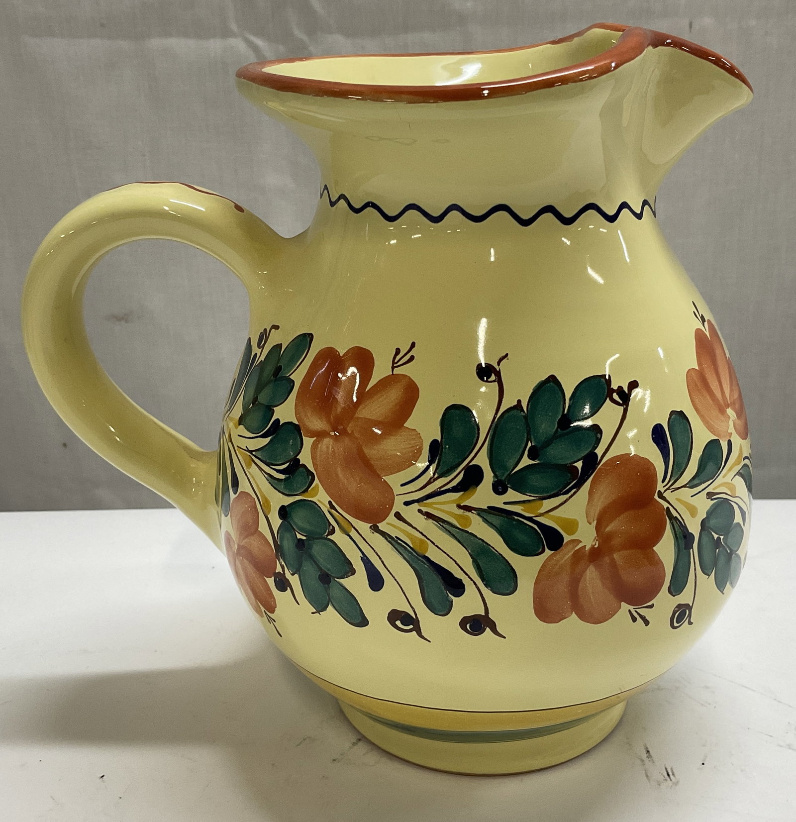 VTG SGND Kinga Szabo HUNGARIAN Folk Art Pitcher: Vintage Circa 1980s-2000s Signed Kinga Szabo Hand-Painted Folk Art Earthenware Pottery Teapot. Made in Hungary. Yellow Glaze with Floral and Striped Designs. Cracks Present on Rim. Measures app 7.5in 