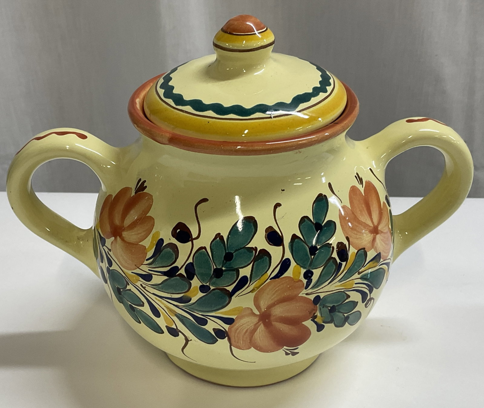 VTG SGND Kinga Szabo Folk Art Pottery Sugar Bowl: Vintage Circa 1980s-2000s Signed Kinga Szabo Hand-Painted Folk Art Earthenware Pottery Sugar Bowl. Made in Hungary. Yellow Glaze with Floral and Striped Designs. Condition Consistent With Exposure. Me
