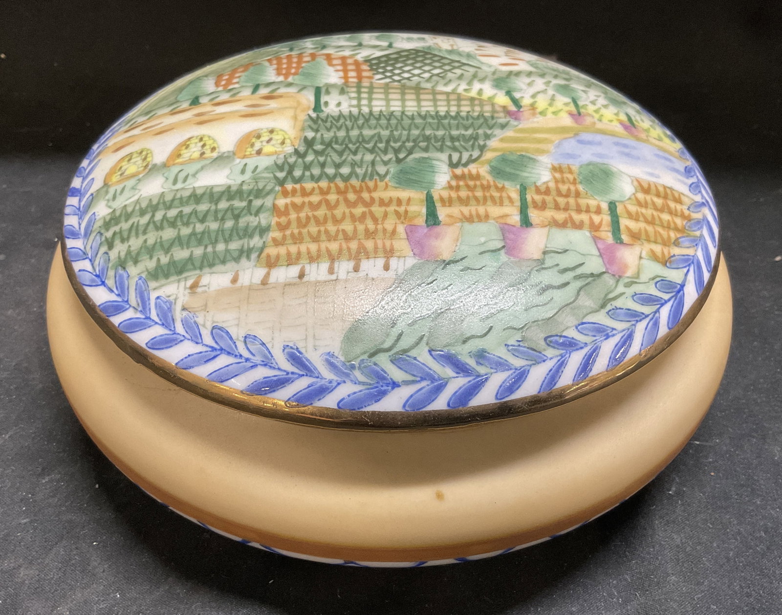 VTG Andrea by Sadek Tuscany Wine Country Box: Vintage Circa 1990s-2000s Andrea by Sadek Tuscany Wine Country Porcelain Trinket Box. Colorful Painted Vineyard and Trees Landscape. Condition Consistent With Exposure. Measures app 3.5in H x 7.25in D