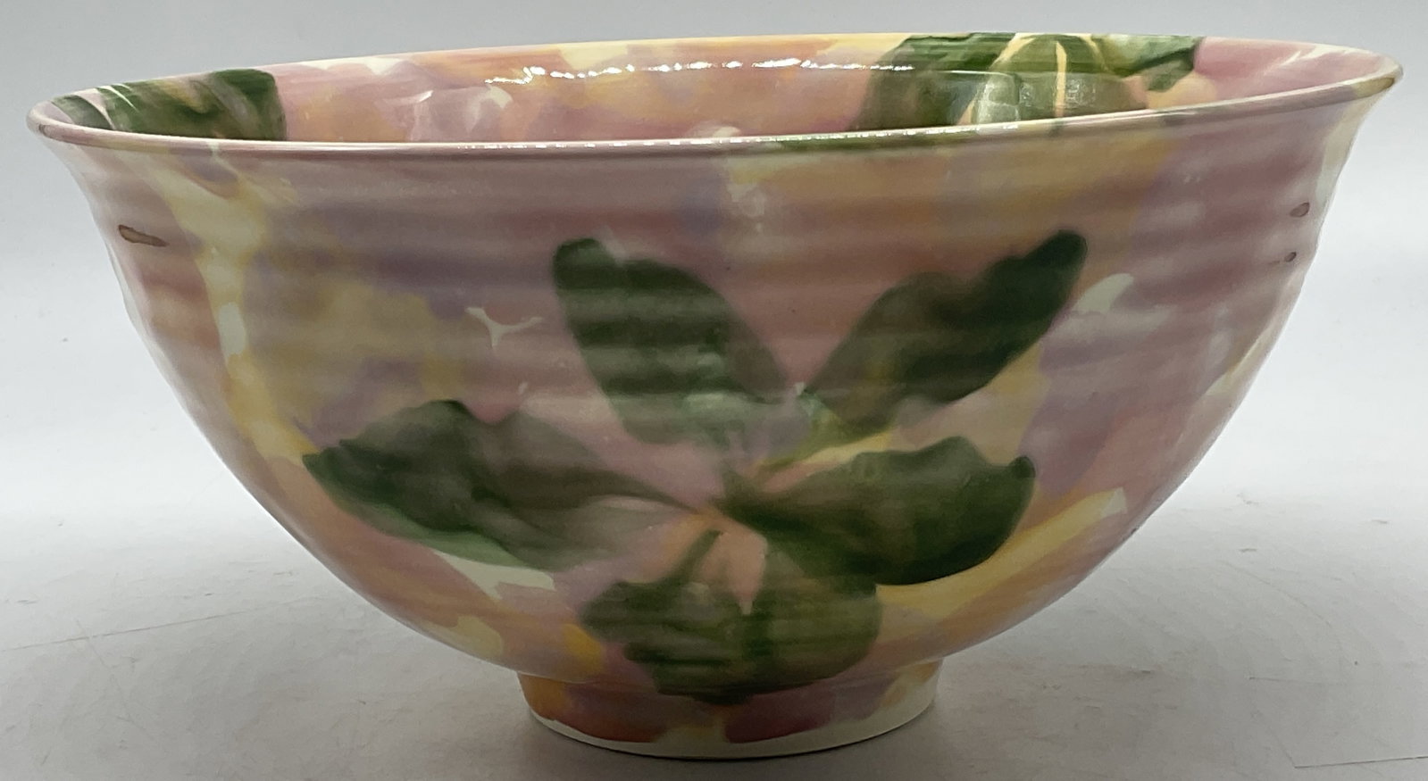 1993 Island Pottery Earthenware Bowl BERMUDA: Vintage 1993 Island Pottery Earthenware Bowl. Tropical Pink, Yellow, and Green Wash. Floral Motifs. Made in Bermuda. Some Crazing. Measures app 4.25in H x 8.5in Diam. Vintage Pottery, Island Pottery,