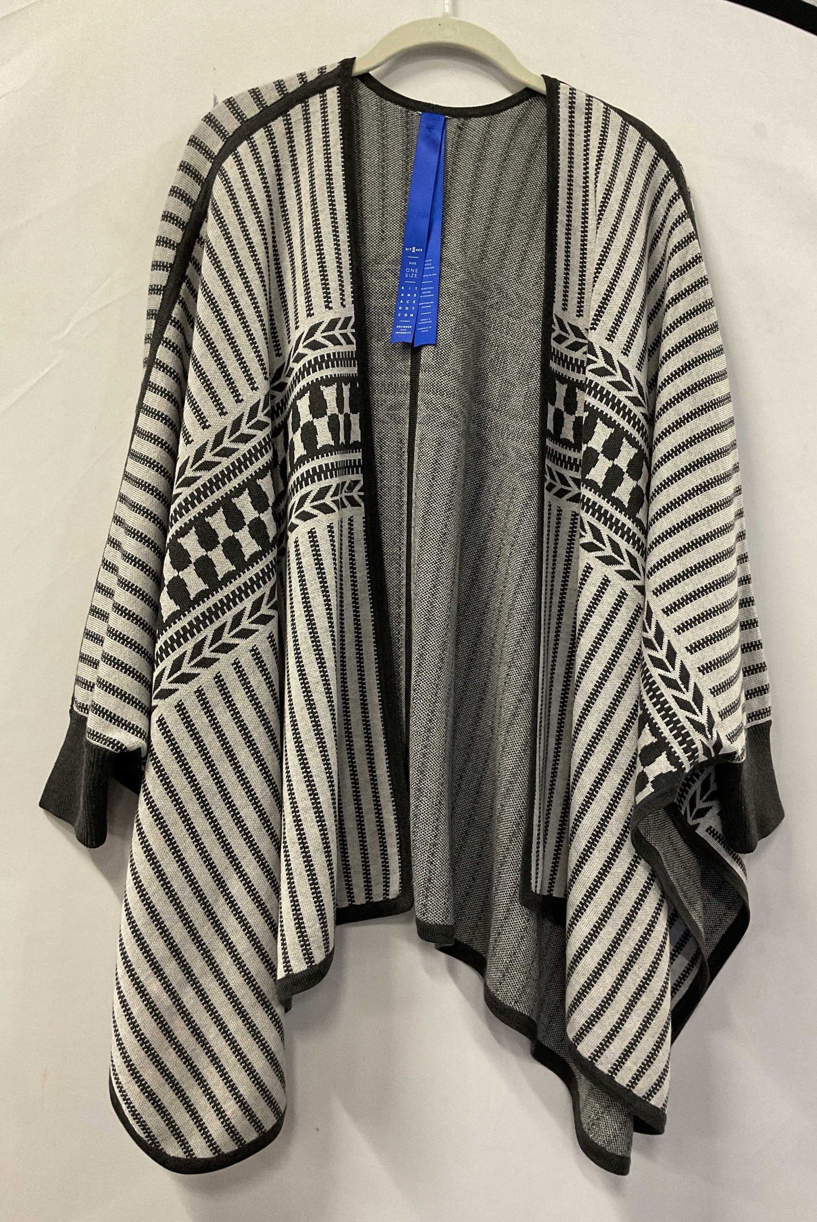 Kit & Ace Black & White Geometric Shawl: Kit & Ace black and white geometric shawl. One size. 85% silk 15% cashmere. Geometric pattern. Wear consistent with exposure. Shawl, Kit & Ace, wearables, clothing, outerwear, fashion, accessories. 4H