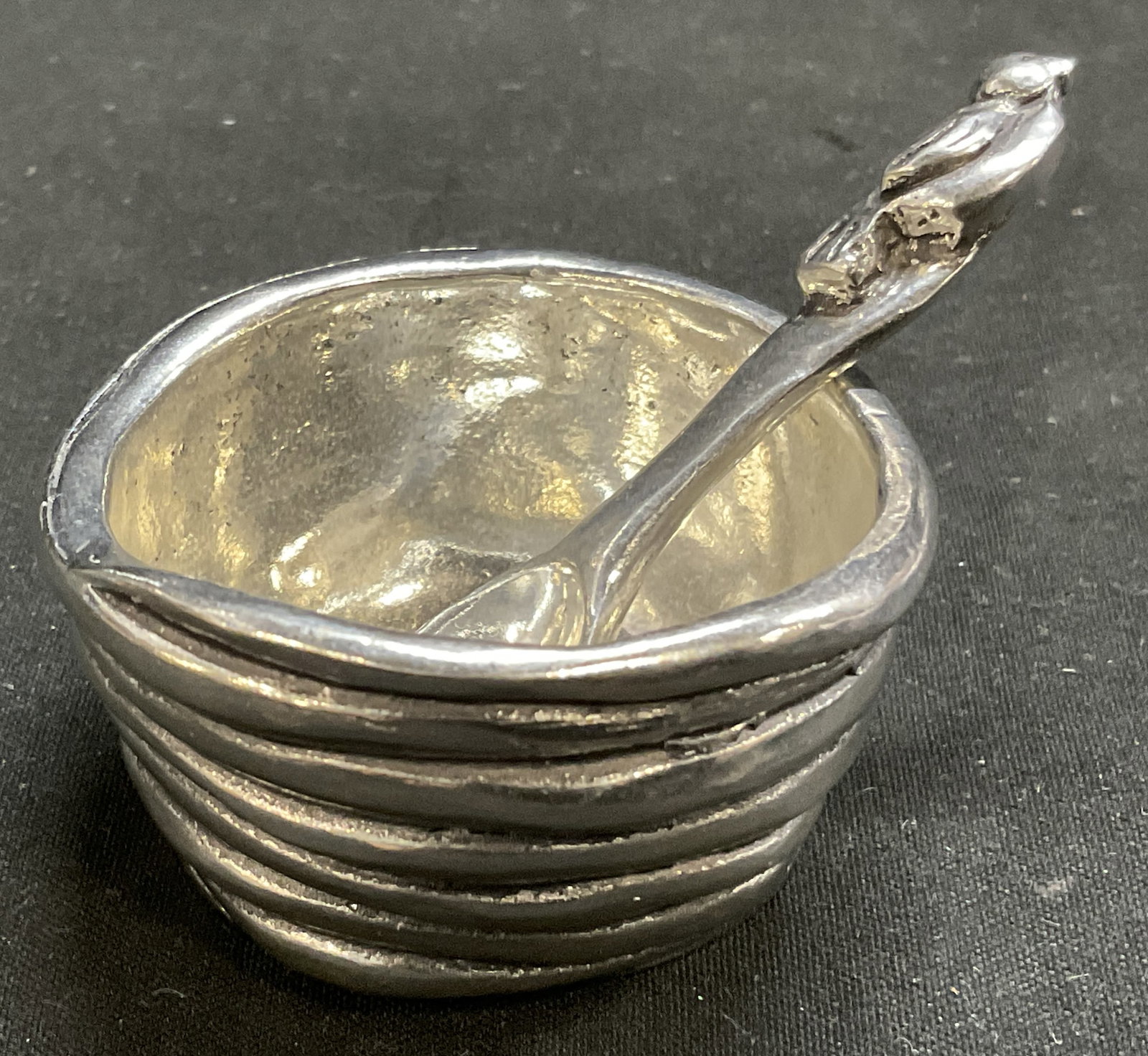 2011 Basic Spirit Pewter Bird&Nest Salt Cellar CA: 2011 Basic Spirit Pewter Salt Cellar. Small Bowl in Shape of Birds Nest with High Relief Eggs Inside. Small Spoon with Bird on Handle. Made in Canada. Condition Consistent With Exposure. Measures app