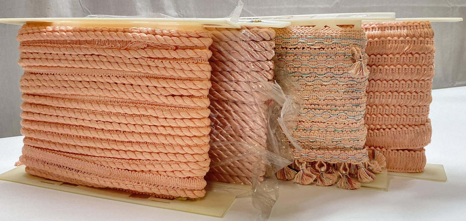 Lt 4 Hollywood Trims Pink Assorted Trim: Lt 4 Hollywood Trims Pink Assorted Trim. Made in Los Angeles, California. Style 2826, 2929, 2267, 2913. Color CS3, 409, 600. Originally 18 and 24 Yards Per Roll. Not Unrolled, Measured, or Inspected.