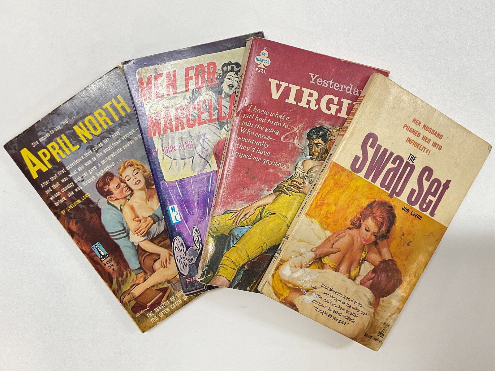 Vtg Lt4 1960s Erotica Pulp Fiction Books: Vintage lot of 4 erotica pulp fiction books. 1. April North by Sheldon Lord, 1961 2. Men for Marcella by John Ring, 1967 3. Yesterdays Virgin by Jason Hytes, 1962 4. The Swap Set by Jim Layne, 1963
