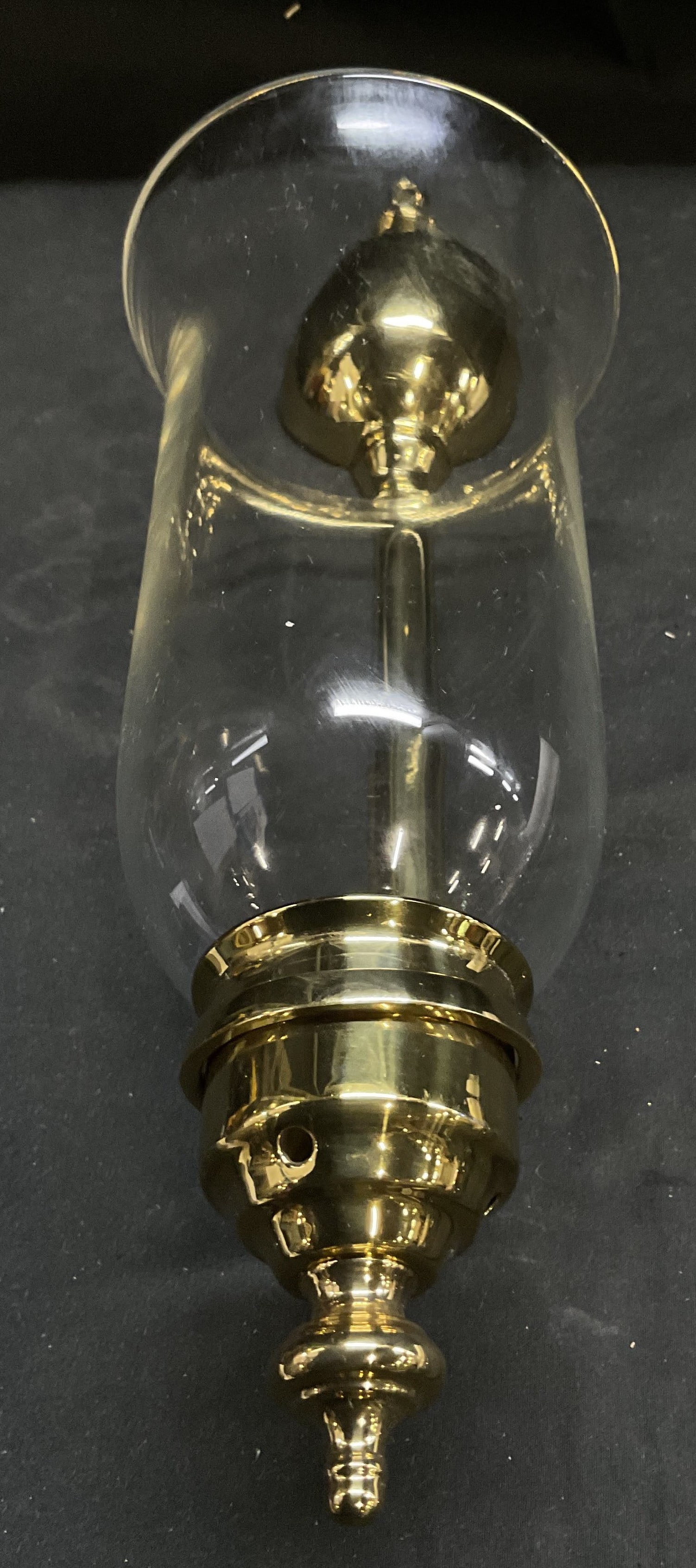 Polished Solid Brass Wall Sconce: Polished Solid Brass Wall Sconce. Clear Glass Hurricane Shade. Scratching Present. Measures app 16in H x 5in Diam. Polished Brass, Wall Sconce, Wall Decor, Lighting, Candles, Home Decor 8 B