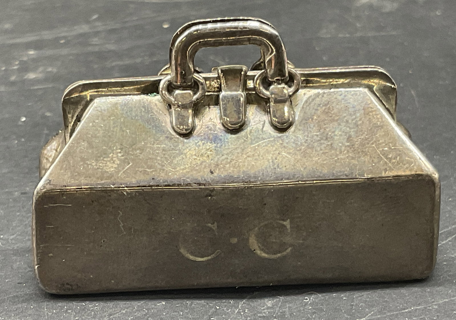 VTG Tiffany&Co STERLING Doctor Bag Pillbox PHILP: Vintage Circa 1980s-1990s Tiffany & Co Sterling Silver Doctor Bag Pillbox. Features Initials CC Monogrammed on Front. Made in the Philippines. Marked Tiffany & Co 925 Philippines. Scratching and Tarni