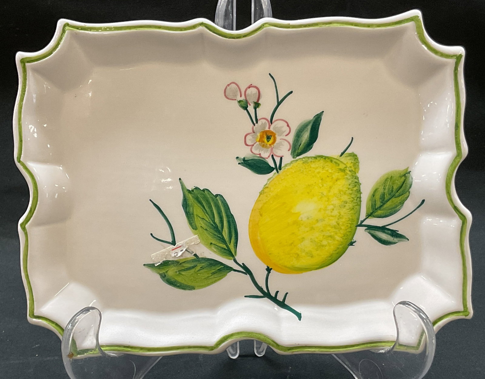 Vtg. The Sea Gull Rst. Serving Dish, Capri, Italy: Vintage The Sea Gull Restaurant in Capri Italy Serving Dish Souvenir. Lemon motif and green rim. Unique shape. Measures approx. 7in w x 5.5 in Back marked The Sea Gull Capri Made Italy Italian Dishwar