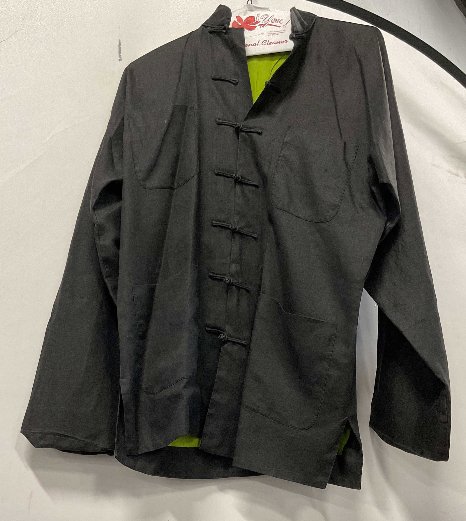 Shanhaitang vintage Asian shirt: Shanhaitang vintage Asian shirt. Black Asian button front shirt with bright green lining, made in China. Size medium with 100% linen shell and 100% silk lining. Big branded patch on inside left pocket