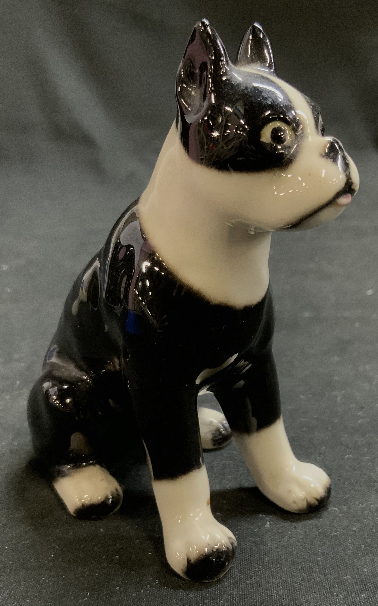 Vtg c.1950s Hand Painted Boston Terrier Fig. Japan: Vintage Hand Painted Porcelain Boston Terrier Figurine. Made in Japan. Circa 1950s. Tuxedo palette, sitting on hind legs position. Tiny pink tongue poking out of mouth. Measures approx. 3.5 in tall x 