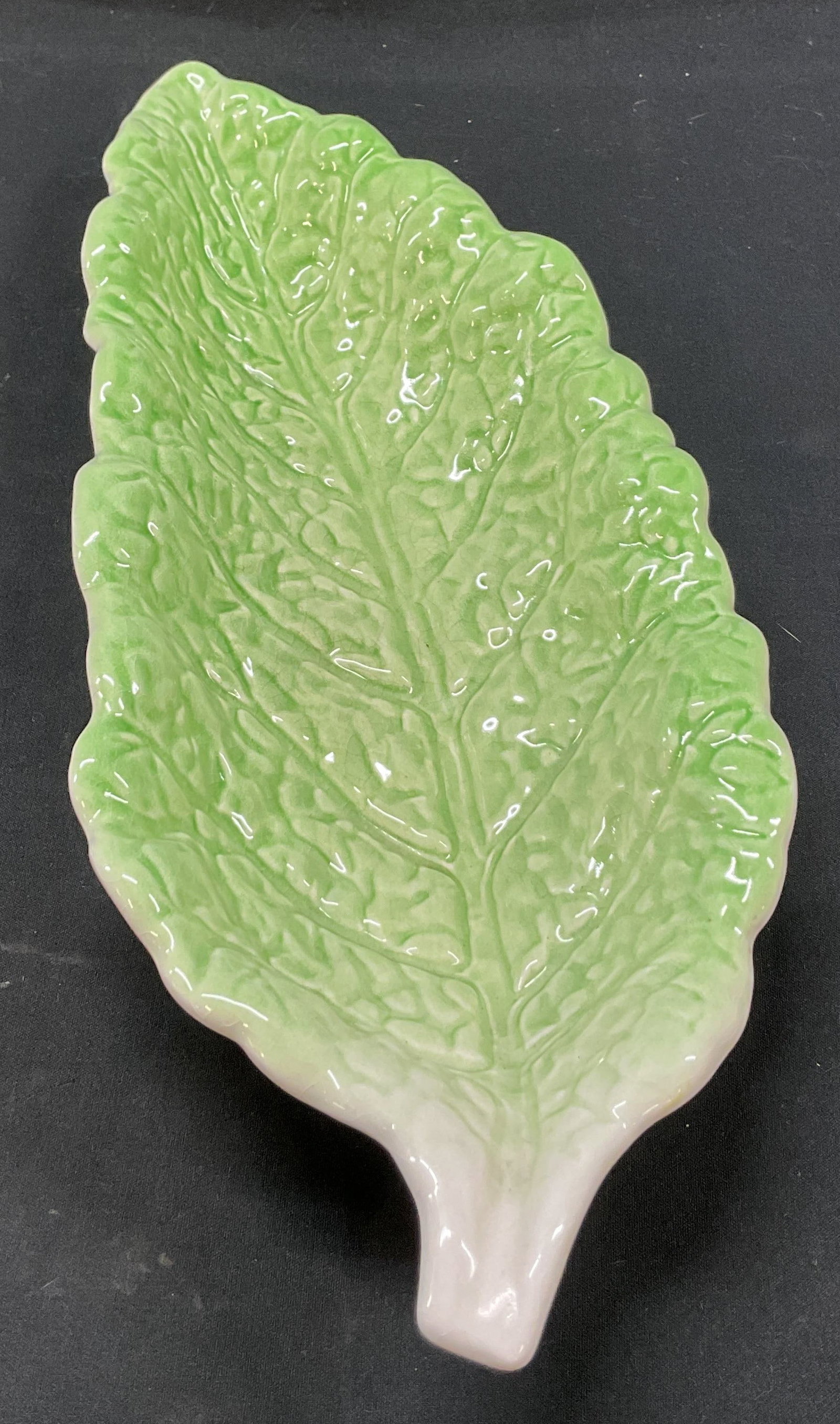 Royal Winton Grimwades Lettuce Leaf Dish England: Royal Winton Grimwades ceramic majolica lettuce leaf dish. Marked on underside, made in England. Lettuce leaf shaped dish, textured surface. Green and white glazed. Scalloped edge. Measures approx 5