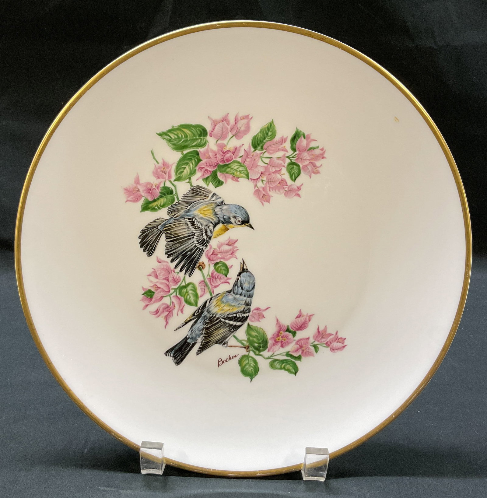 Boehm Woodland Birds Of America Plate England: Boehm Woodland Birds Of America bone china plate. Marked on underside as photographed here. Made in England. The plate portrays Americas favorite Woodland Birds, series of eight plates. Gilt rim.