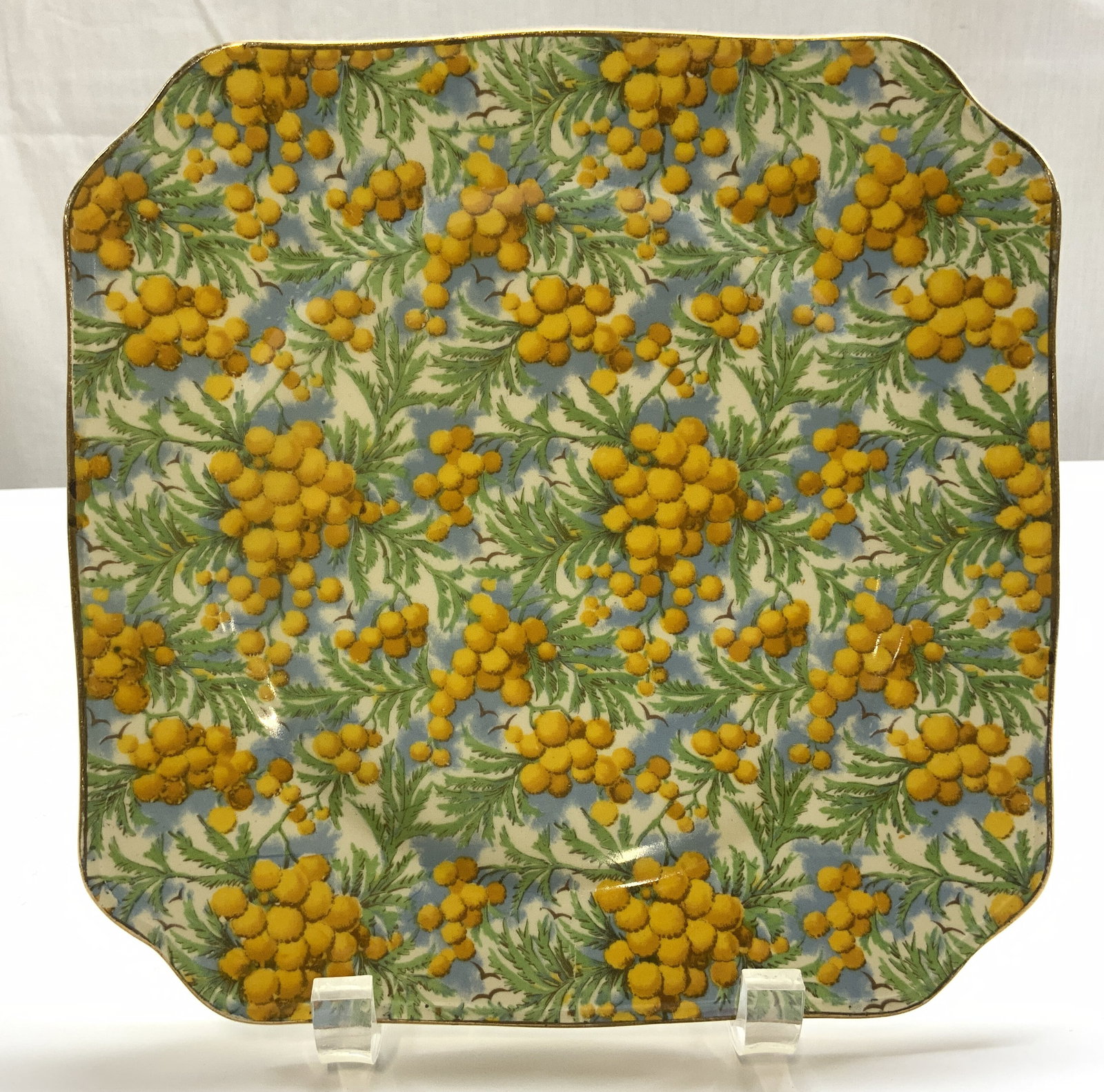 Vtg Empire Ware Gldn Wattle Square Plate, England: Vintage Empire Ware Golden Wattle Chintz Pattern Square Plate. Shelton, England. Circa 1940s. All-over transfer pattern of golden wattle blossoms. Gold gilt trim. Backside marked Golden Wattle,