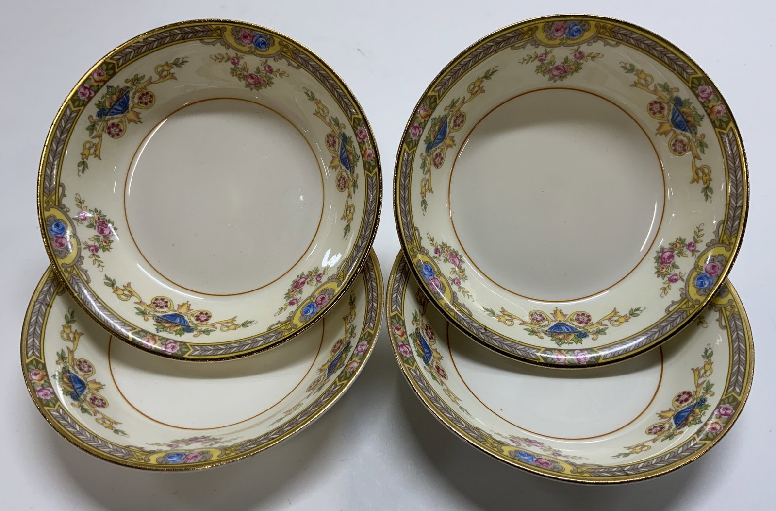 Vtg Lt4 Pope Gosser Berry Bowls, USA: Vintage Lot of 4 Pope Gosser Berry bowls in Carlyle pattern. Made in USA. Circa 1930s. Border of floral swags and fruit urns. Inner rim and outer edge finished with gold gilt trim. Backside marked pop