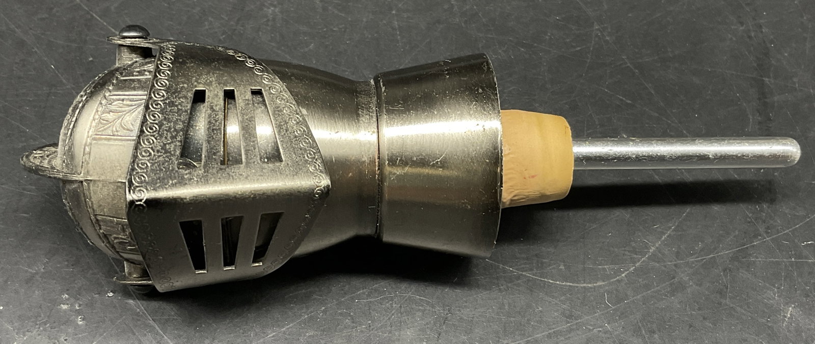 VINTAGE 1960s Knight Helmet Bottle Pourer: Vintage Circa 1960s Knight Helmet Bottle Pourer. Chrome-Plated Helmet with Detailed Engravings Attached to Spout with Stopper. Designed to Pour a Specific Amount of Liquor. Scratching and Wear to Plat