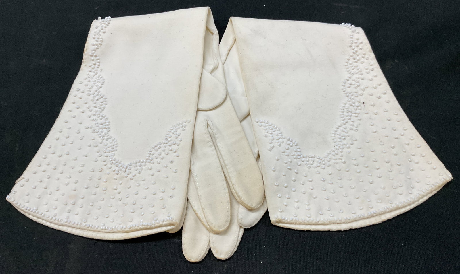 Vintage White Suede Beaded Opera Gloves: Vintage white suede beaded opera gloves. White beaded design. Measures approx 4.5 x 13.5 inches. Blemishes and wear. Gloves, opera gloves, wearables, accessories, fashion, outerwear. 4CS