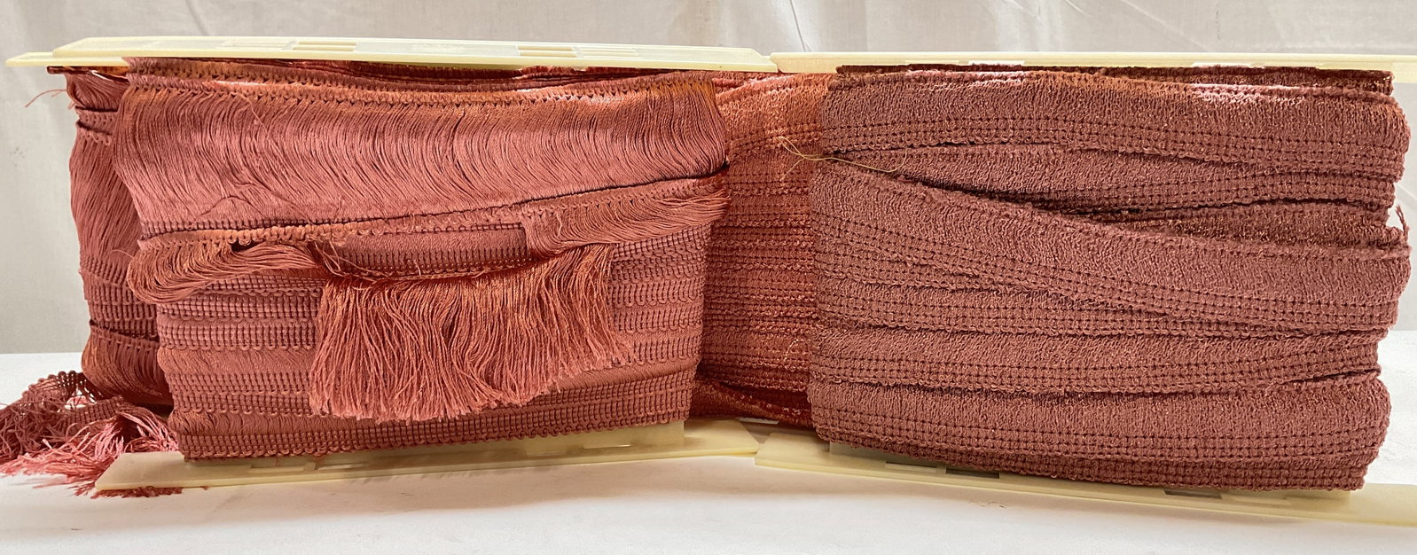 Lt 4 Hollywood Trims Coral Pink 100% Rayon Trim: Lt 4 Hollywood Trims Coral Pink 100% Rayon Fringe Trim. Made in Los Angeles, California. Style 266 and 2654. Color 616 and 605. Originally 12 and 18 Yards Per Roll. Not Unrolled, Measured, or Inspecte
