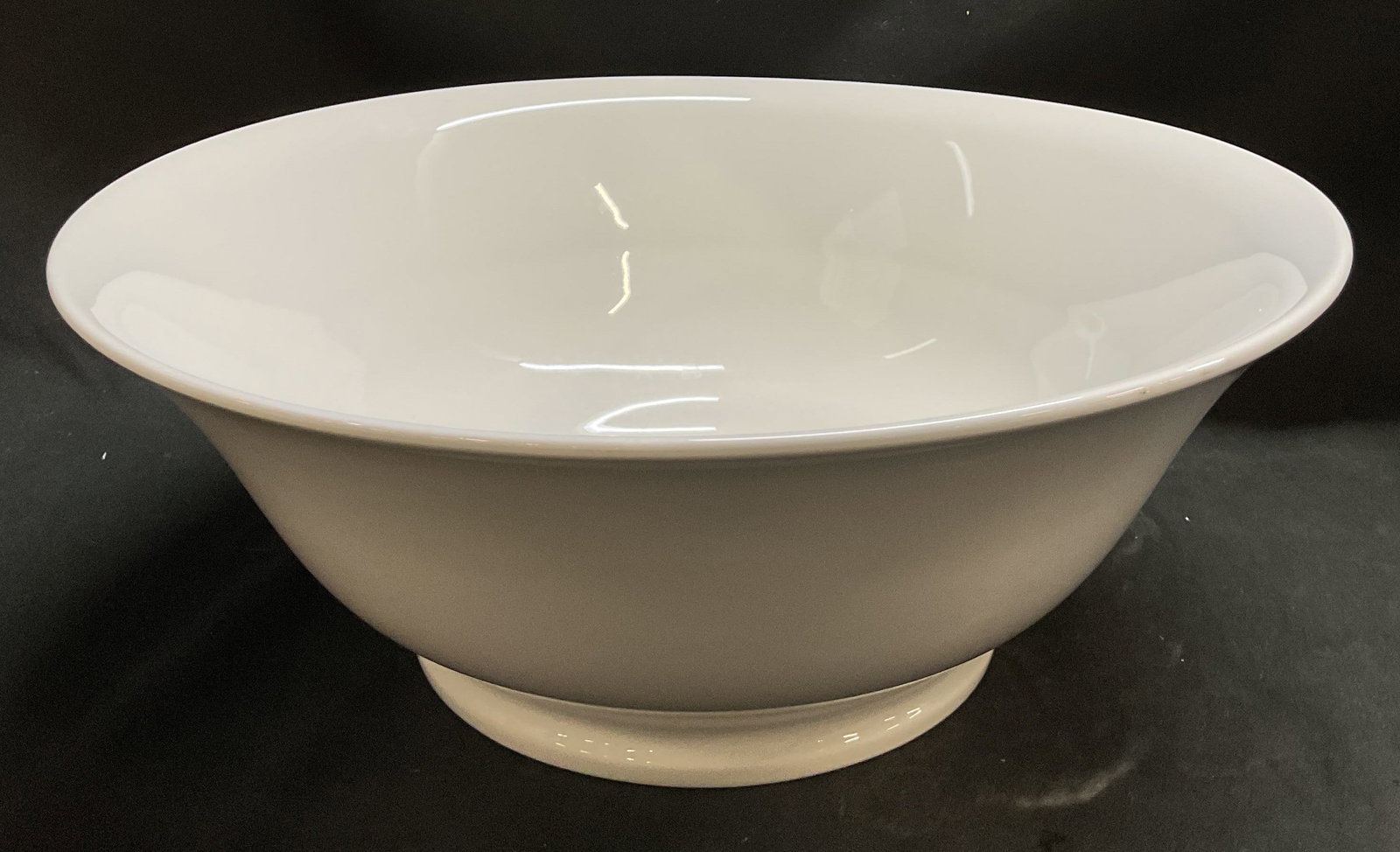 Pillivuyt Porcelain Serving Bowl FRAMCE: Pillivuyt porcelain serving bowl. White toned. Round base. Signed & marked on underside. Reads, PILLIVUYT. Surface wear consistent to age, use & exposure. Measurements: length 13.2in x width 13.2in x 