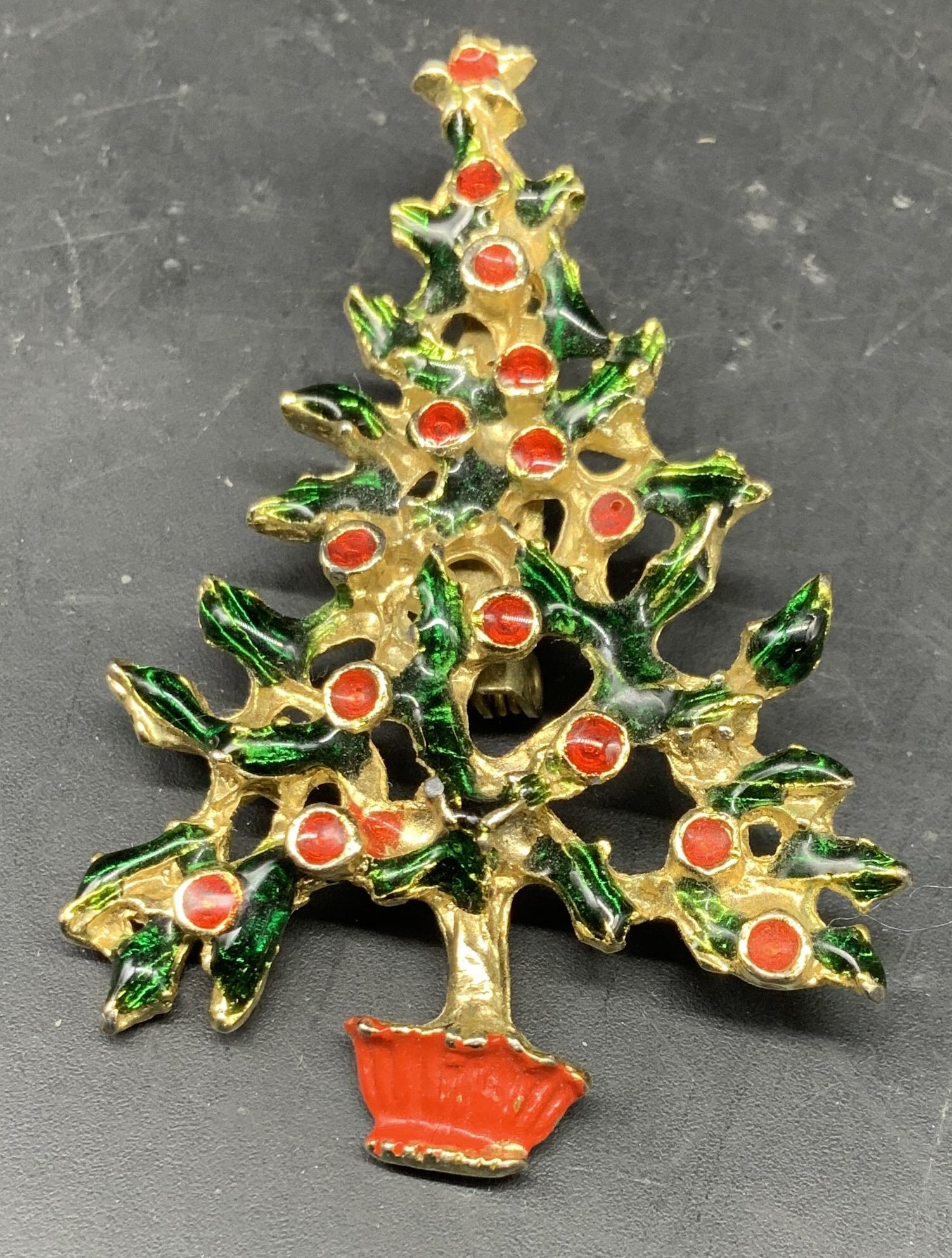 Vintage gold Tone enamel Christmas Tree Pin: Vintage gold tone Christmas tree pin with red and green enameled holly and berry leaves red enamel base, vintage Holiday jewelry, vintage Christmas brooch, estate jewelry measures ht app 2.5 inches