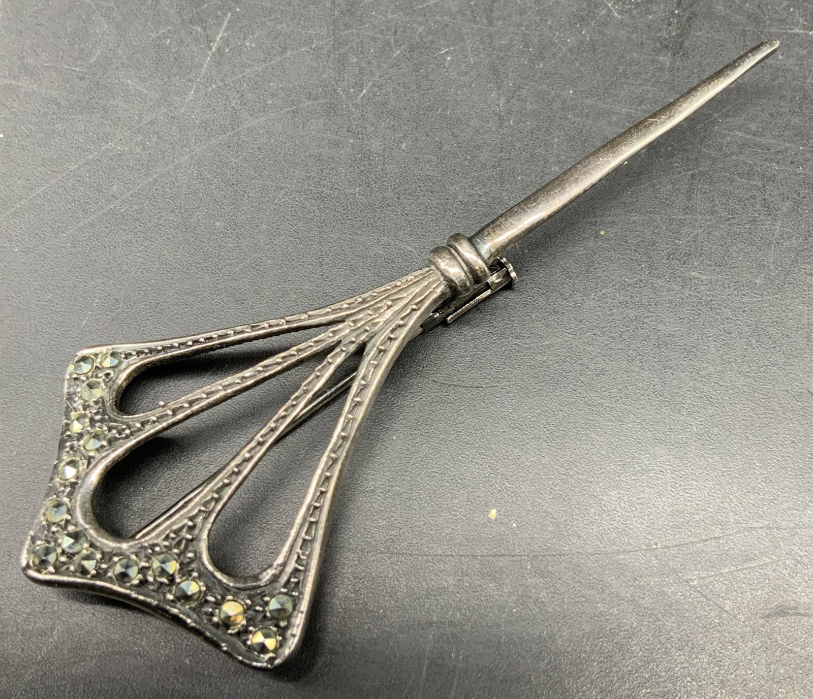 Antq Sterling Silver Deco Hatpin: Antique Sterling Silver hat pin or stick pin, Limely from early 1900s, features a diamond shaped top adorned with Marcasite stones, measures length app 3 inches width app 1.25, antique estate jewelry,