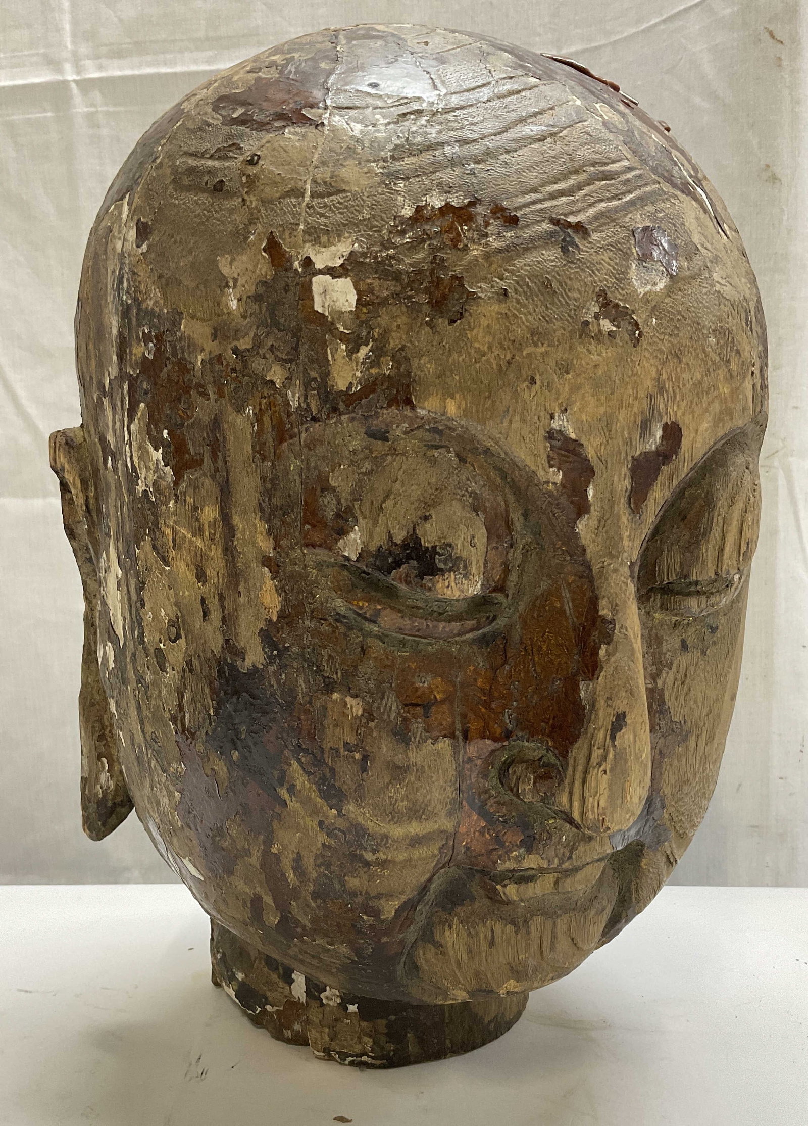 ANTIQUE 19th C 14in Wooden Buddha Head Statue: Antique Circa 19th Century Wooden Buddha Head Statue. Possibly from Asia. Cracks in Wood and Worn Brown Glaze. Measures app 14in H x 11in Diam. Antique Statues, 19th Century, Wooden Sculpture, Buddha 