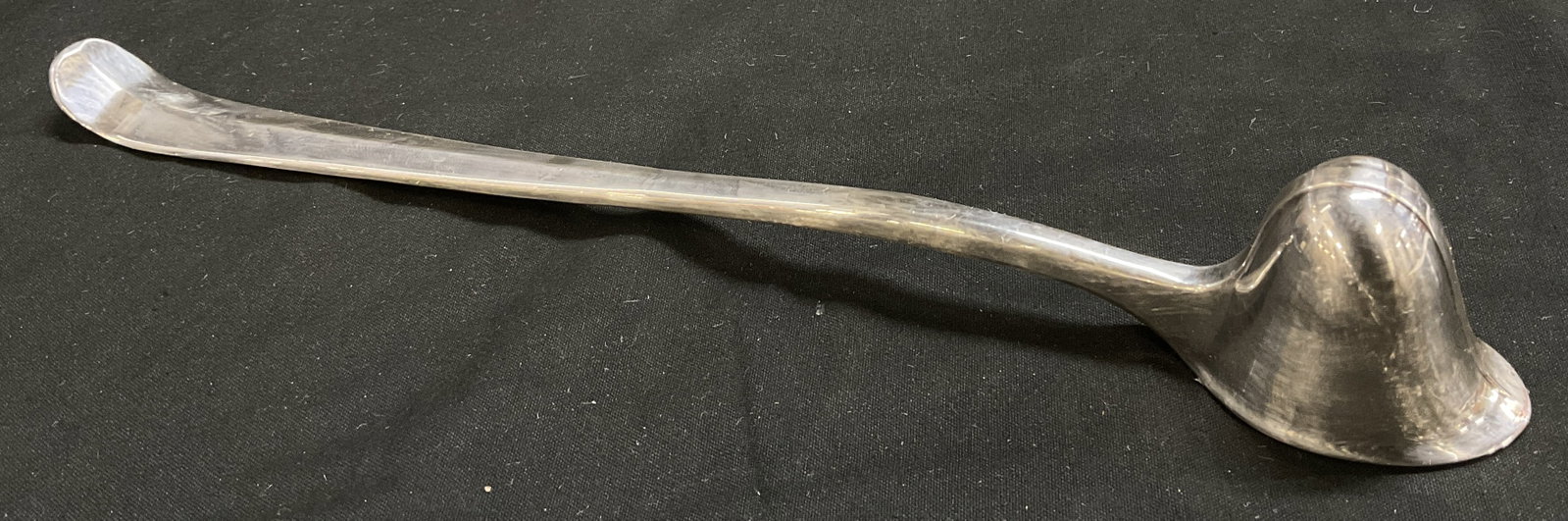 VTG Gerity Slvr-Pltd Cavalier Helmet Cndle Snuffer: Vintage Gerity Products Silver-Plated Candle Snuffer. Cavalier Helmet Design at Tip. Stamped with G and Numerical and Symbol Markings. Scratching, Aging to Metal, and Wear to Plating. Measures app 9.5