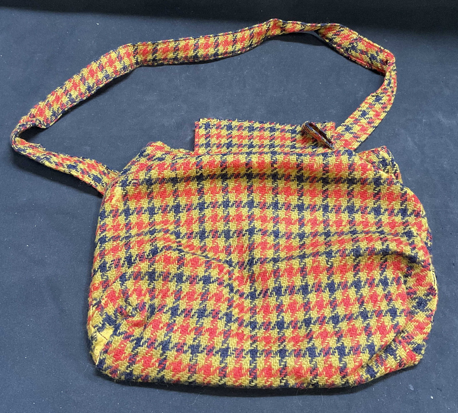 Vintage-Style Slouchy Plaid Woven Wool Bag: Vintage-Style Slouchy Plaid Woven Wool Bag. Retro Red and Blue Plaid Pattern on Yellow Background. Yellow Satin Lining. Tears and Fraying Present. Strap Needs Reattachment. Measures app 9.5in L x 10in