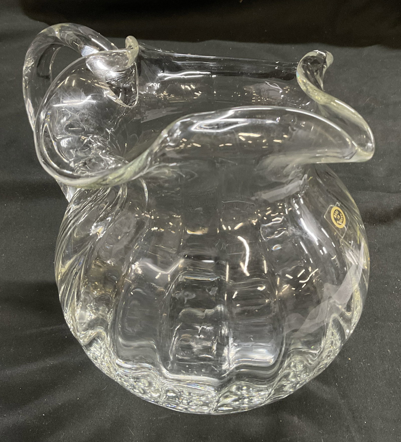 Hand-Blown Clear Art Glass Pitcher HUNGARY: Hand-Blown Clear Art Glass Pitcher With Ruffled Rim. Made in Hungary. Condition Consistent With Exposure. Measures app 6in H x 7in Diam. Hand-Blown, Art Glass, Artisans, Ruffled Rim, Pitchers, Kitchen