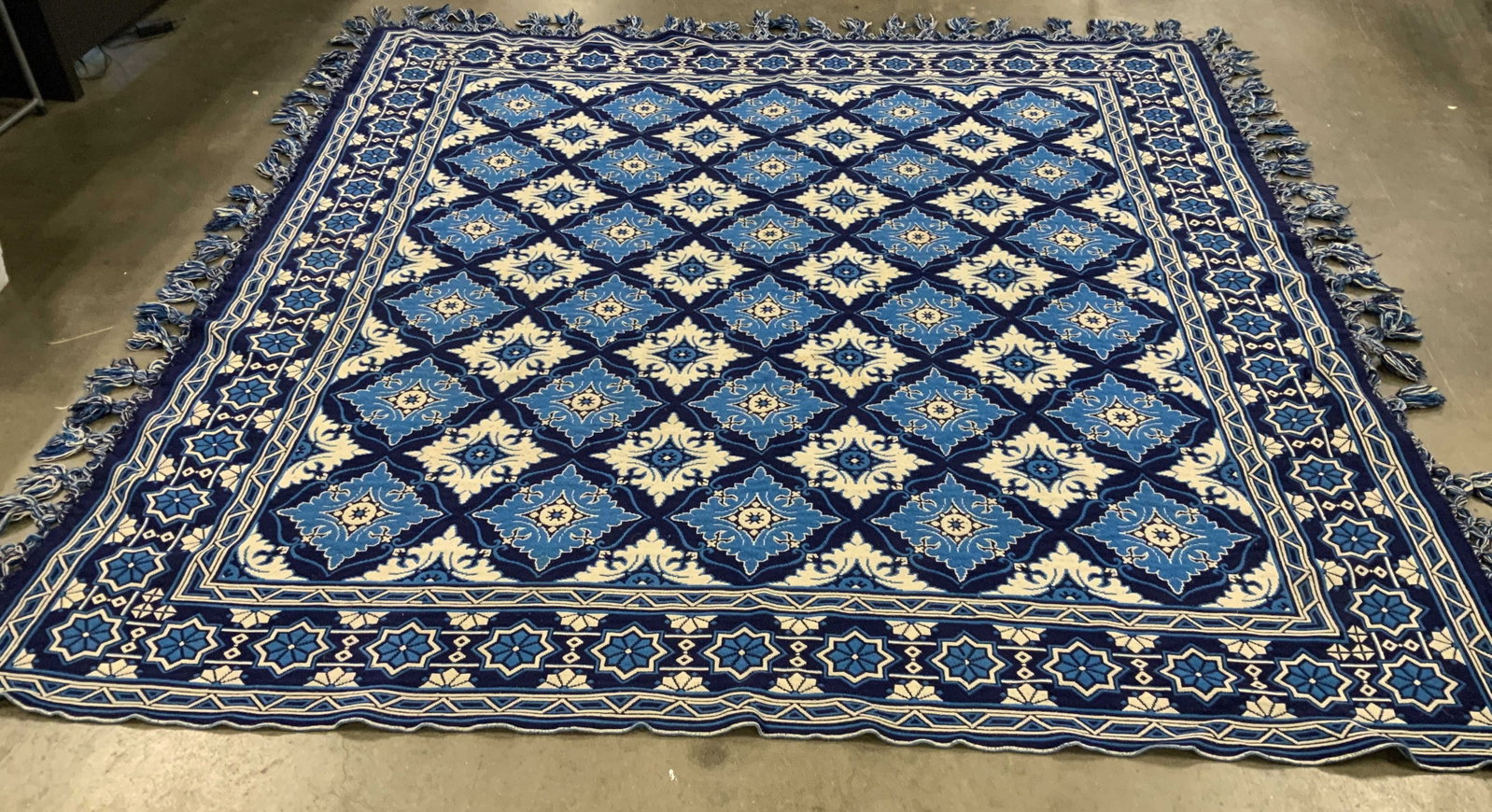 Blue white Geometric Woven Throw Blanket: Blue and white Geometric Woven fringed throw, , measures app 94 by 99 inches, fringes on three sides, bulk