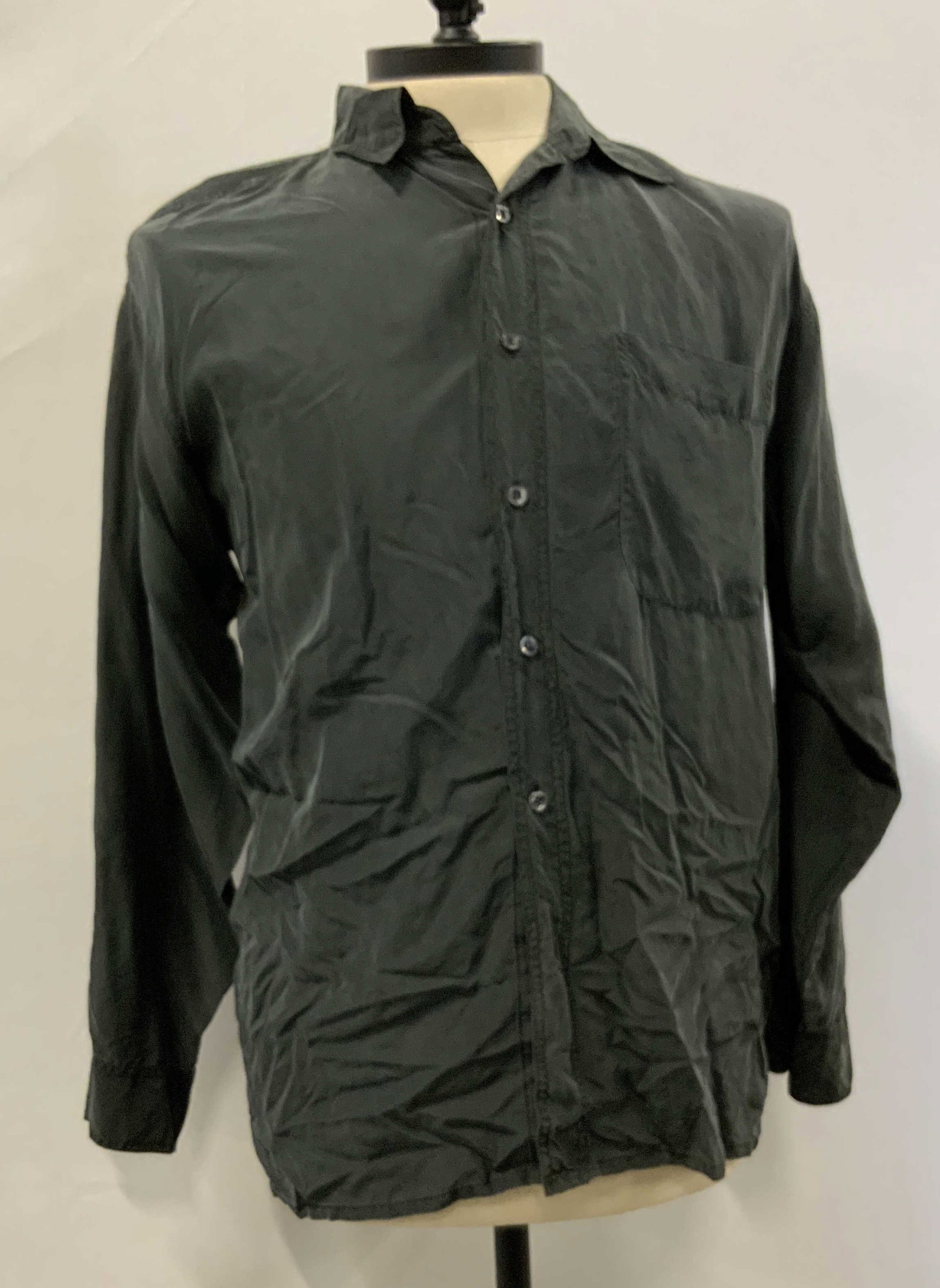 Hualilan lightweight silk grey button down shirt: Hualilan lightweight silk grey button down shirt. Shirt has buttons down the middle and on the cuffs of the sleeves. One left chest pocket. Size large. Button down, silk H 11