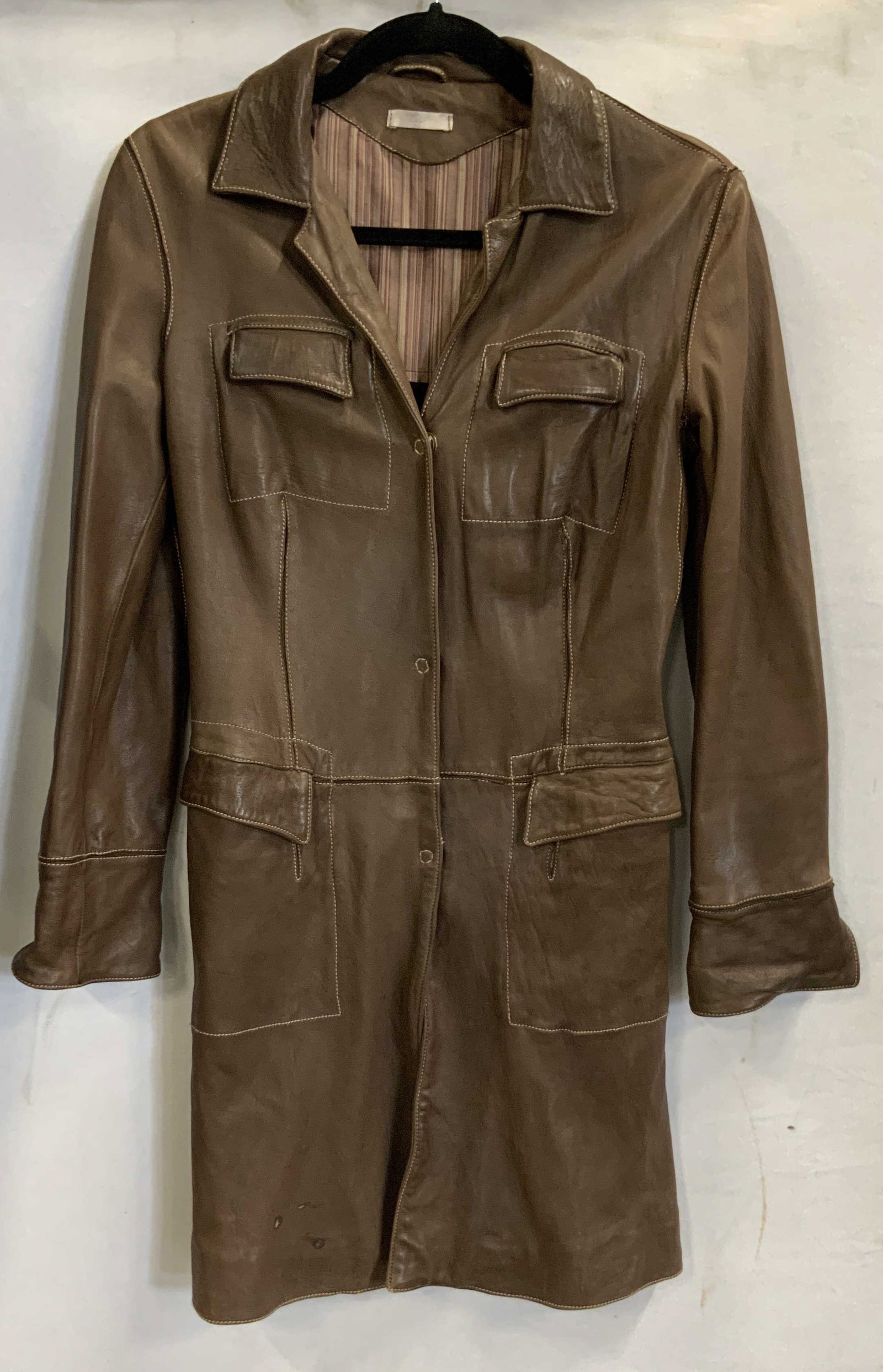 Blur brown leather jacket cotton made in Italy: Blue brown leather jacket. Made of 100% cotton made in Italy. Size 40. Jacket features 4 front pockets and a button snap closure. Made in Italy , cotton, leather jacket H 11